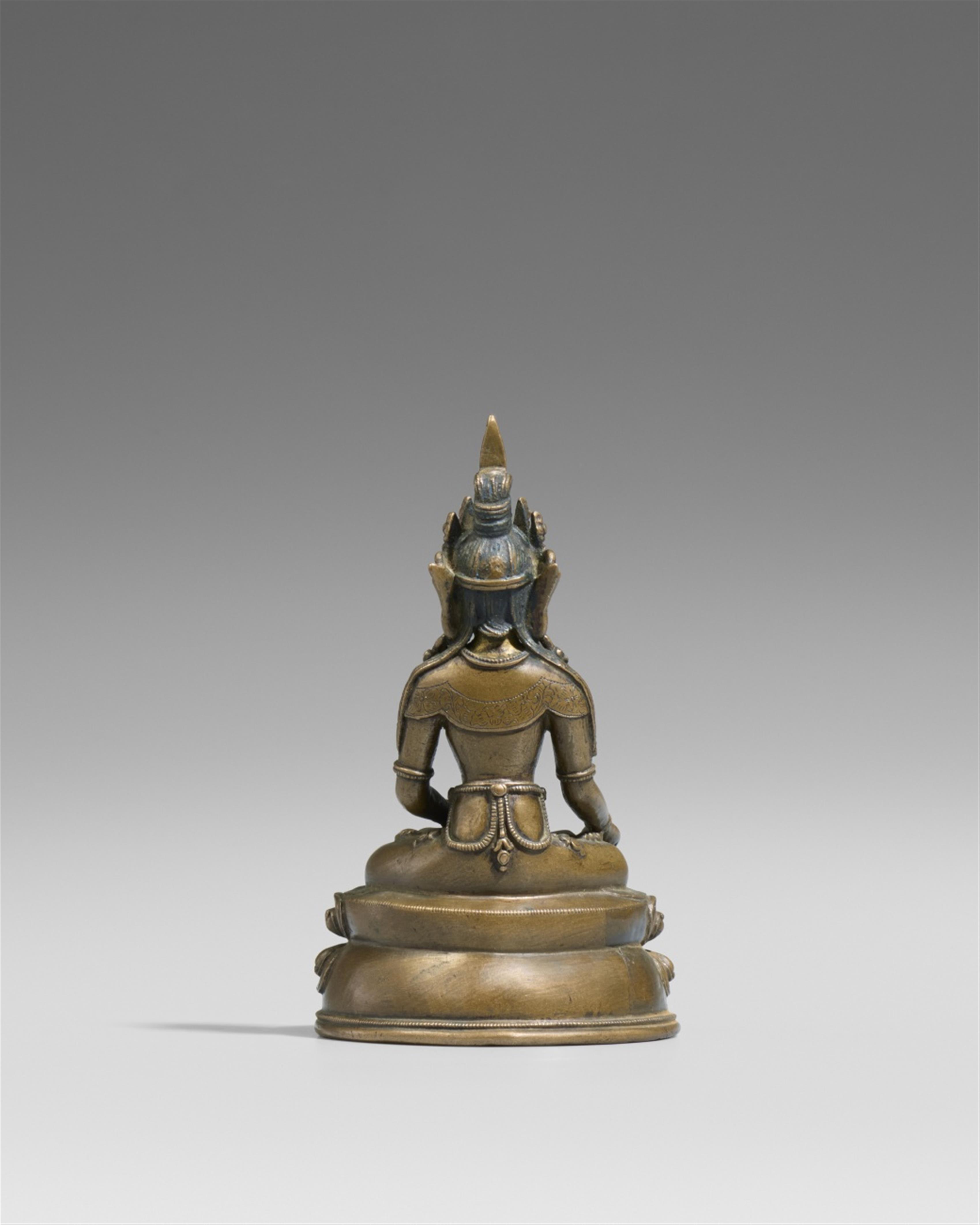 A Tibetan copper alloy figure of Buddha Ratnasambhava. 16th century - image-2