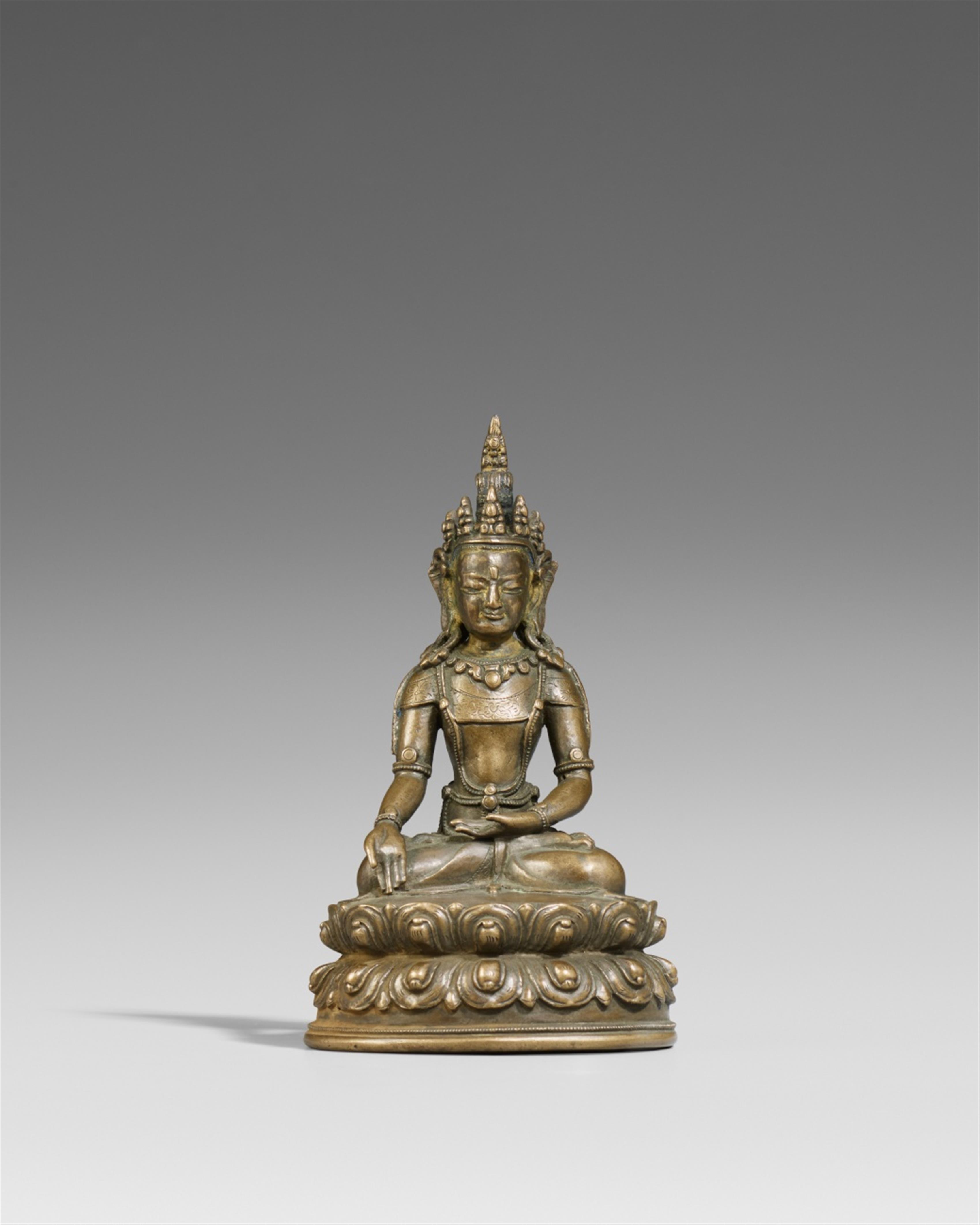 A Tibetan copper alloy figure of Buddha Ratnasambhava. 16th century - image-1