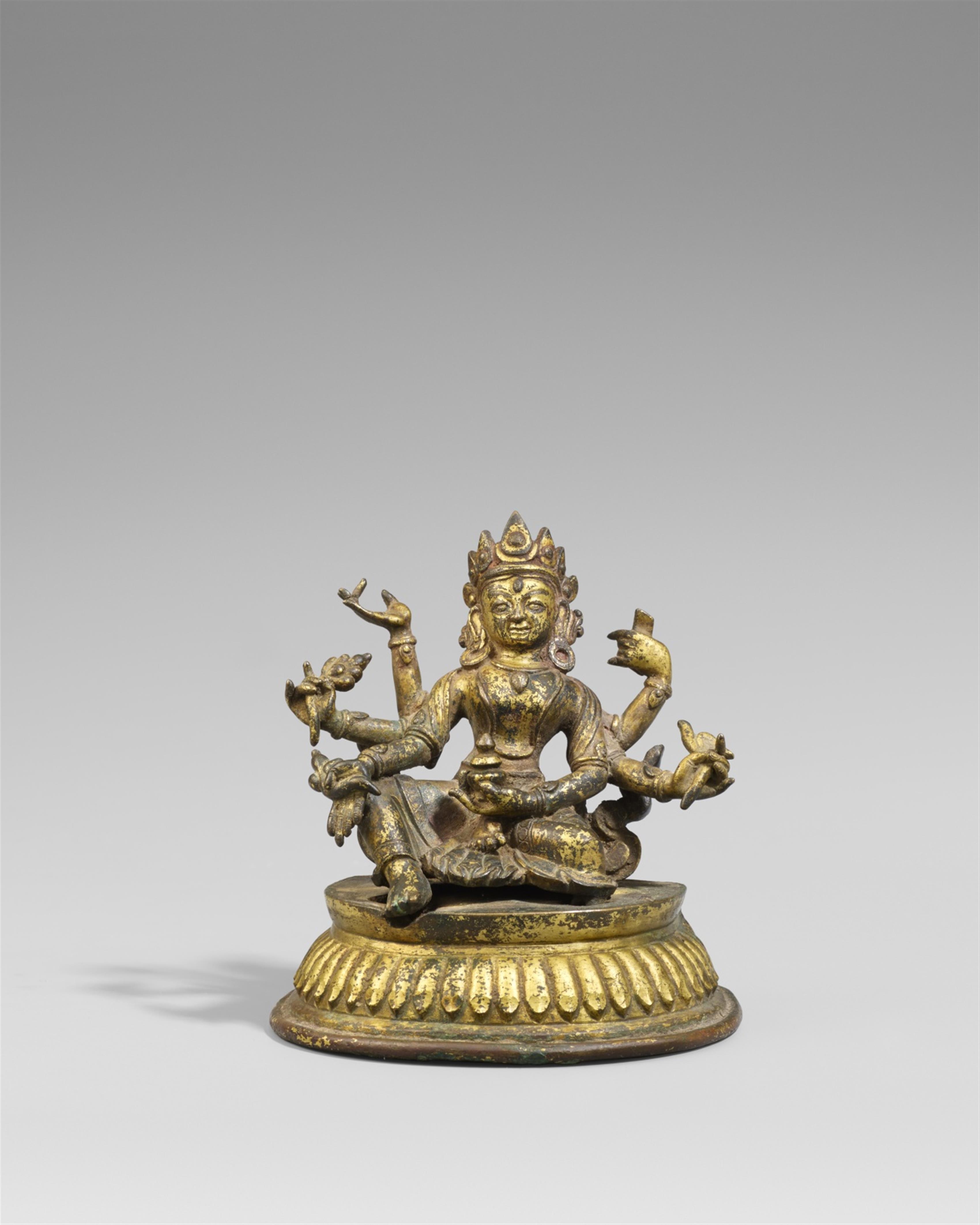 A fine Nepalese gilt copper alloy figure of Vasudhara. 17th/18th century - image-1