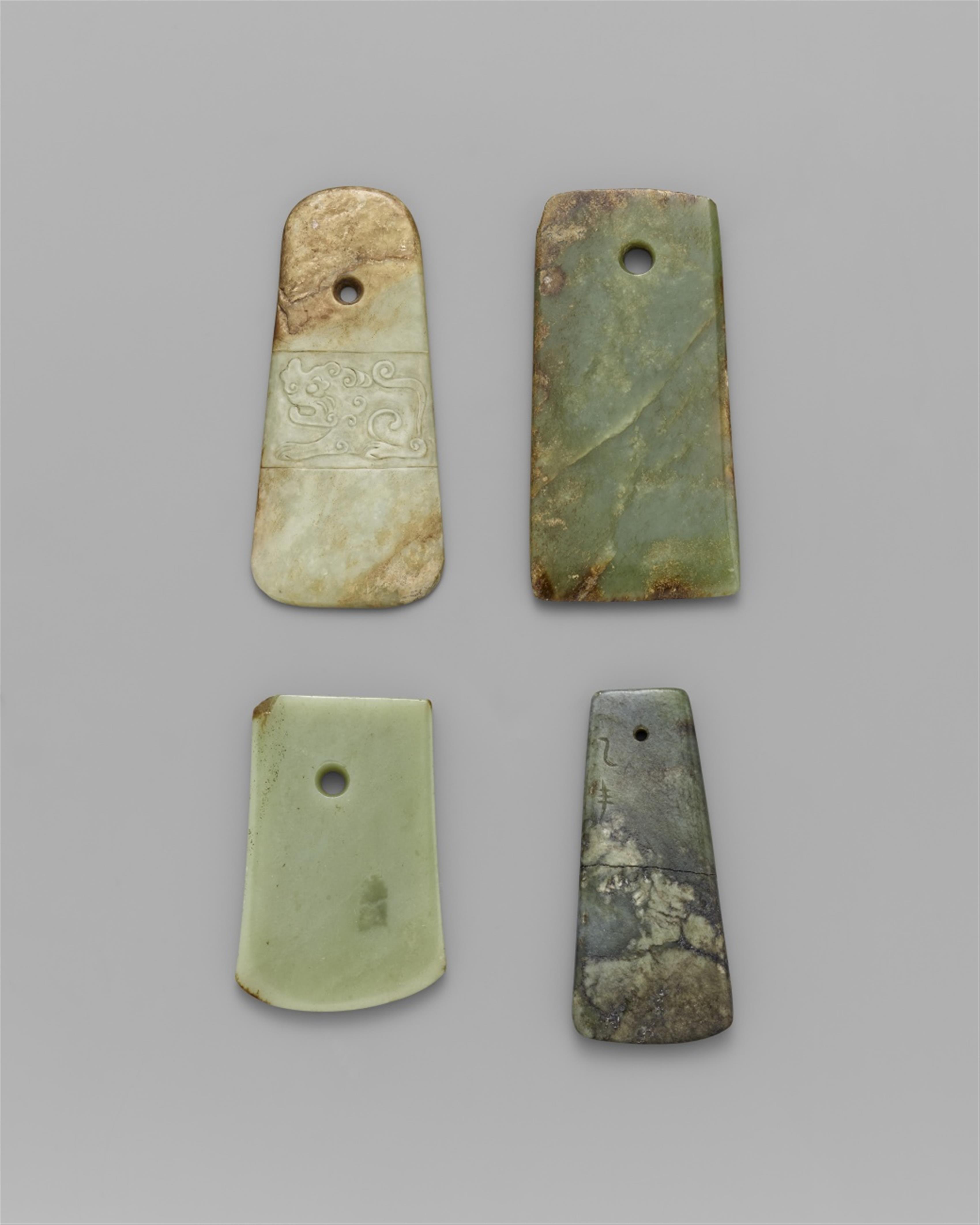 Four jade ceremonial axe heads, yue. Probably Neolithic period (6500-1700 BC) - image-1