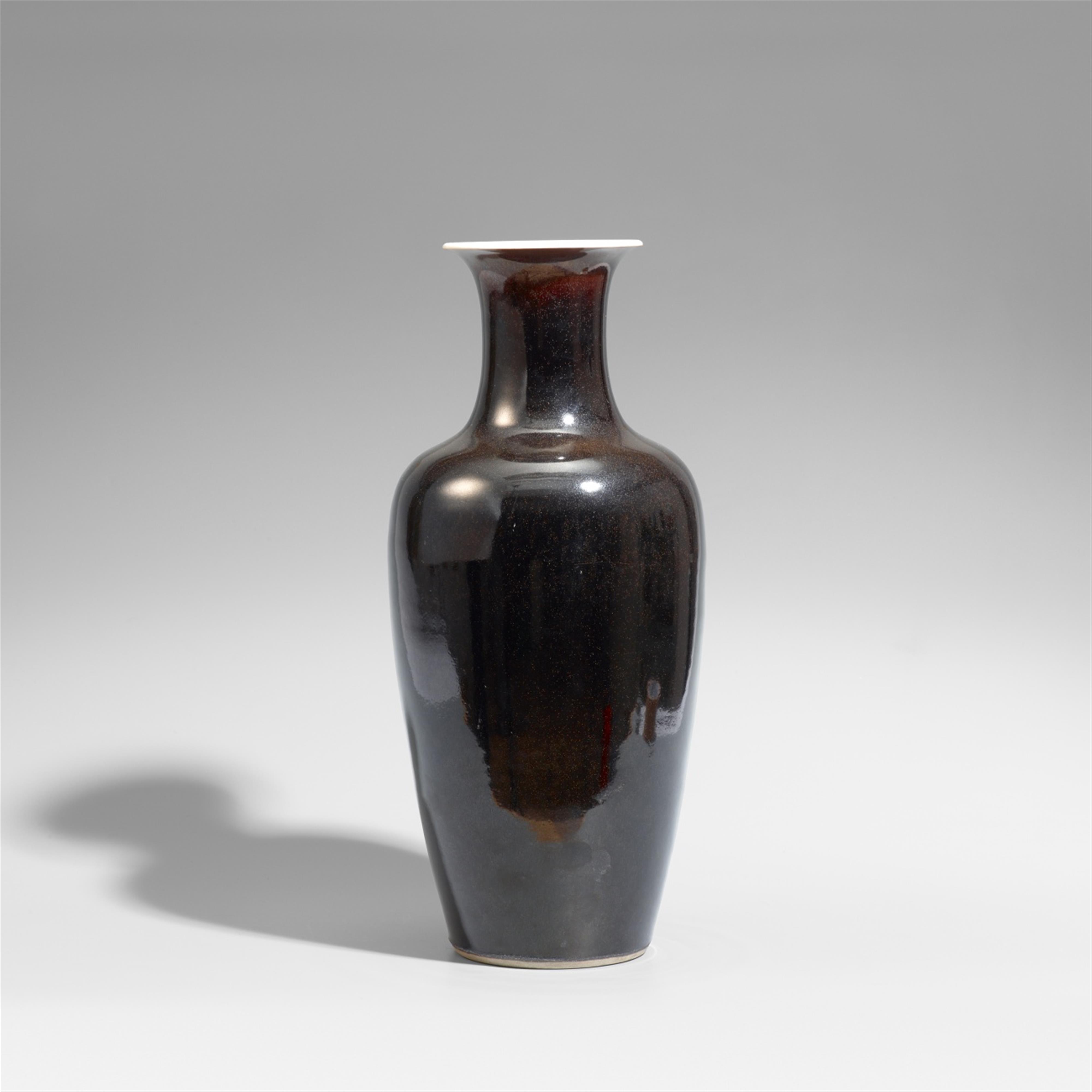 A mirror-black glazed vase. Early 20th century - image-1