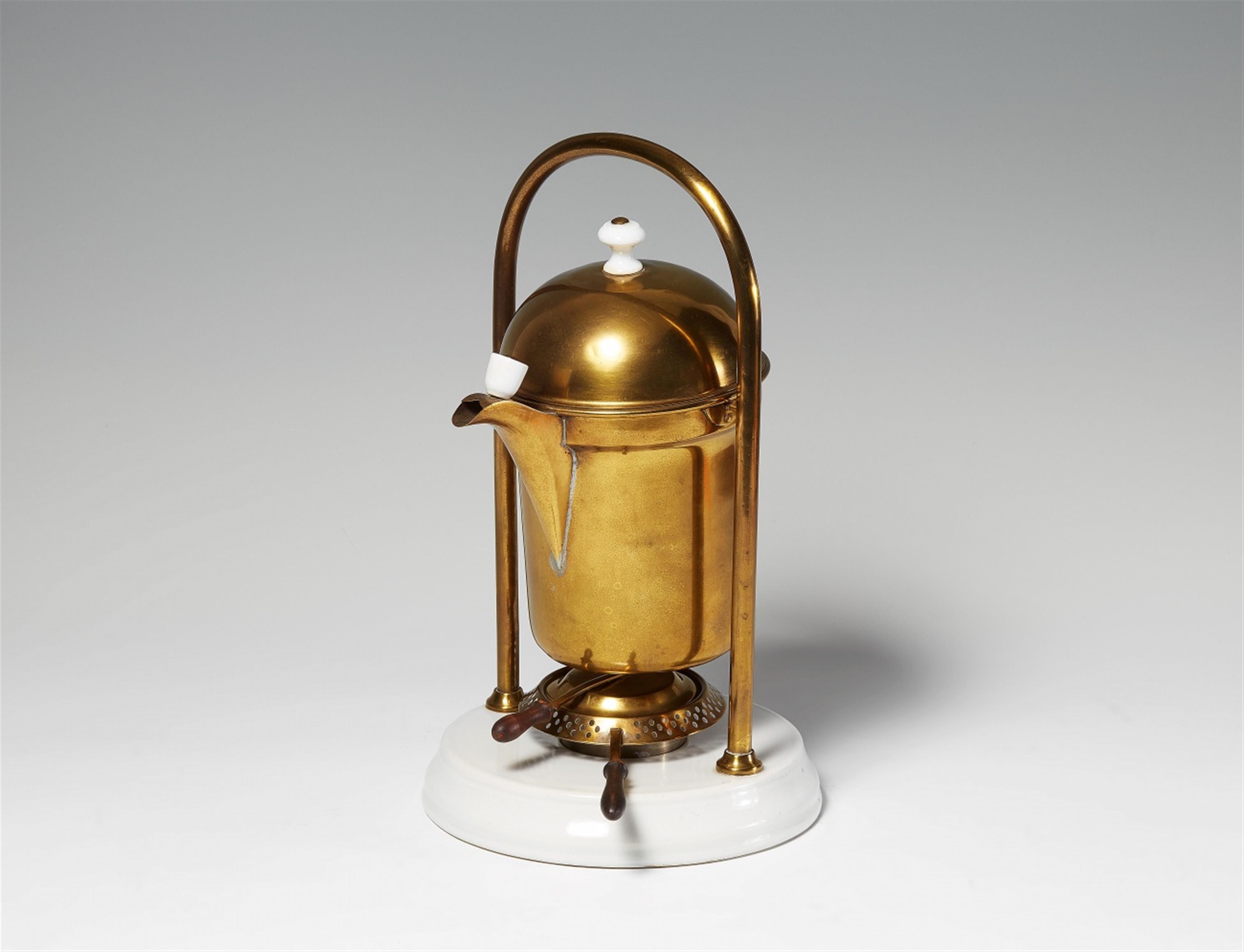 A brass tilting coffee maker - image-1