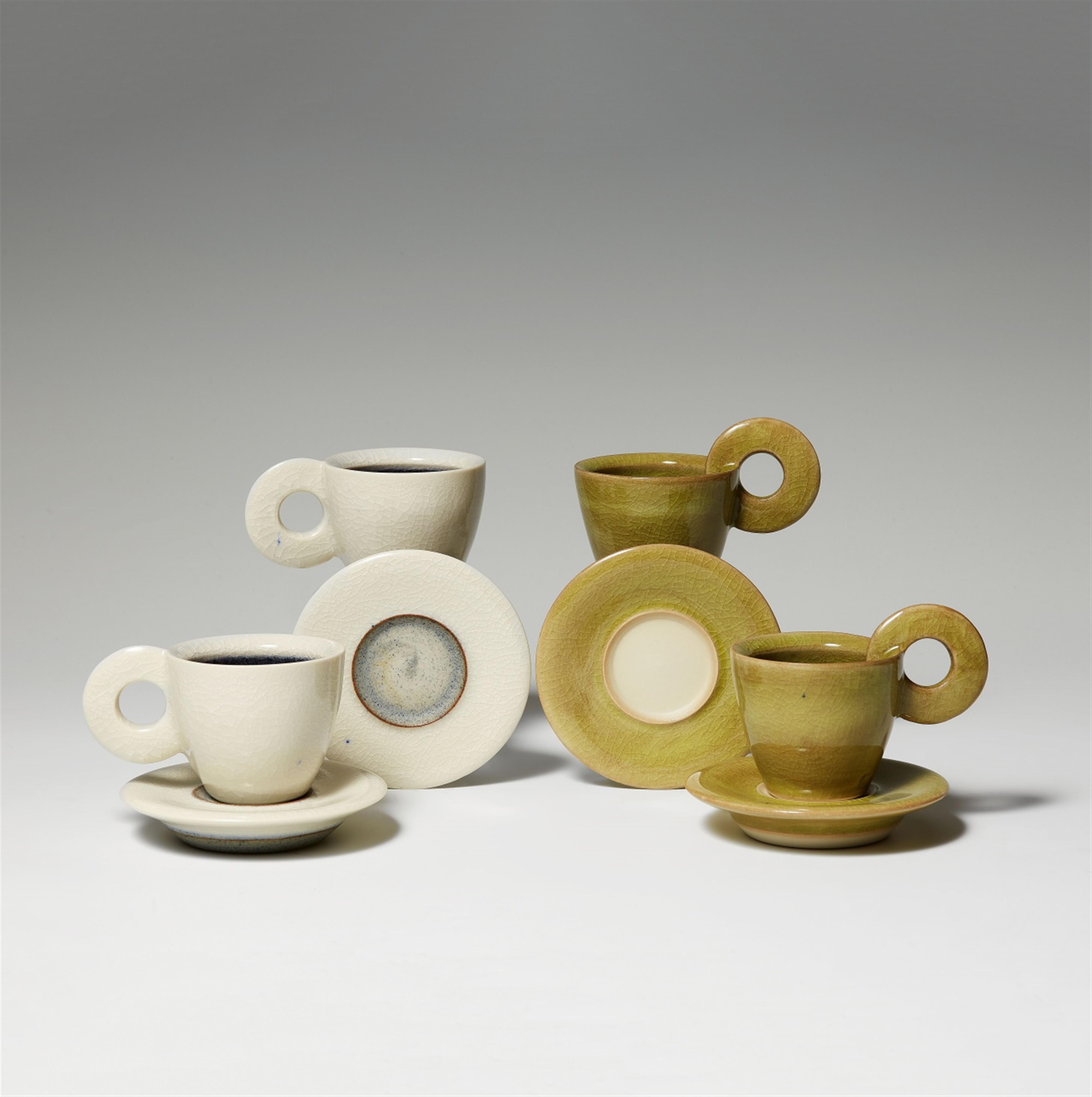 Four artist designed porcelain cups and saucers - image-1