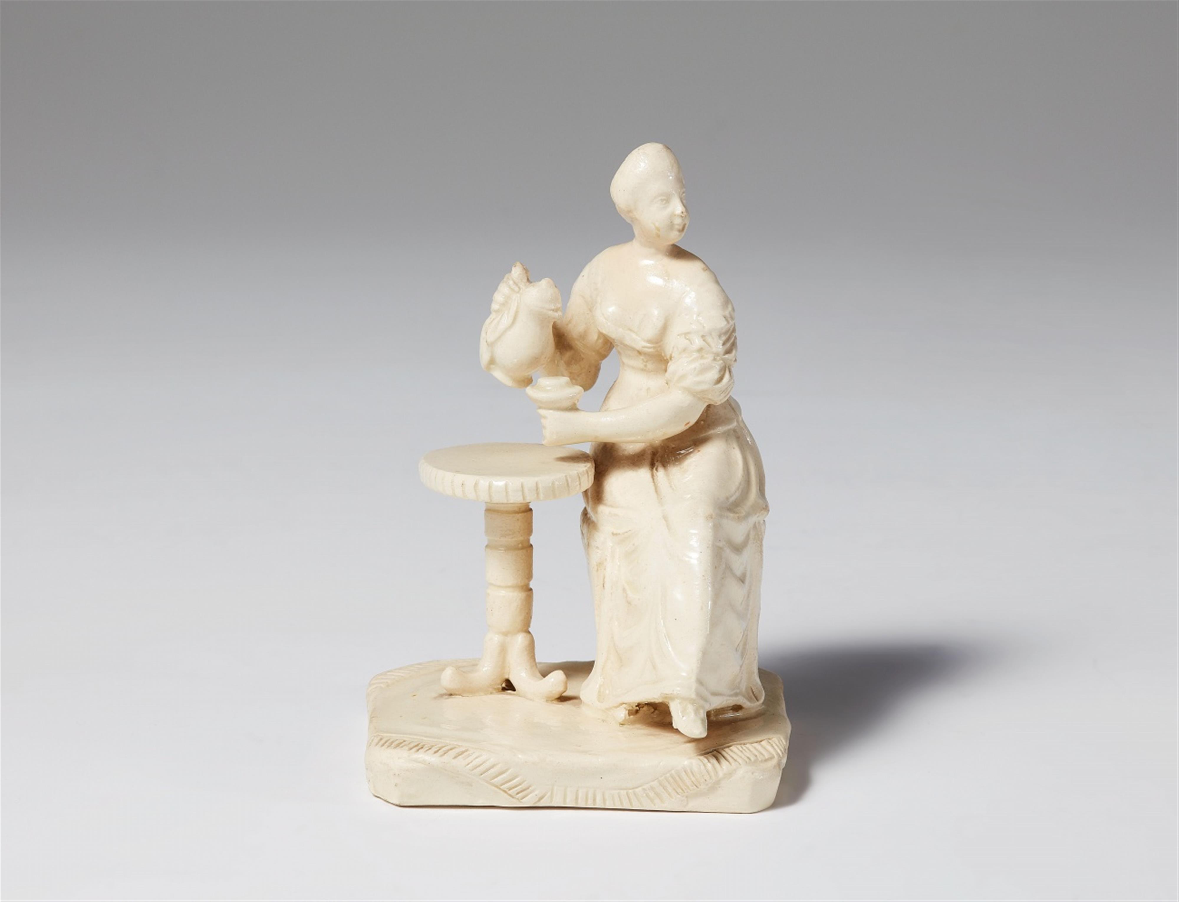 A small Zurich stoneware figure of a lady drinking coffee - image-1