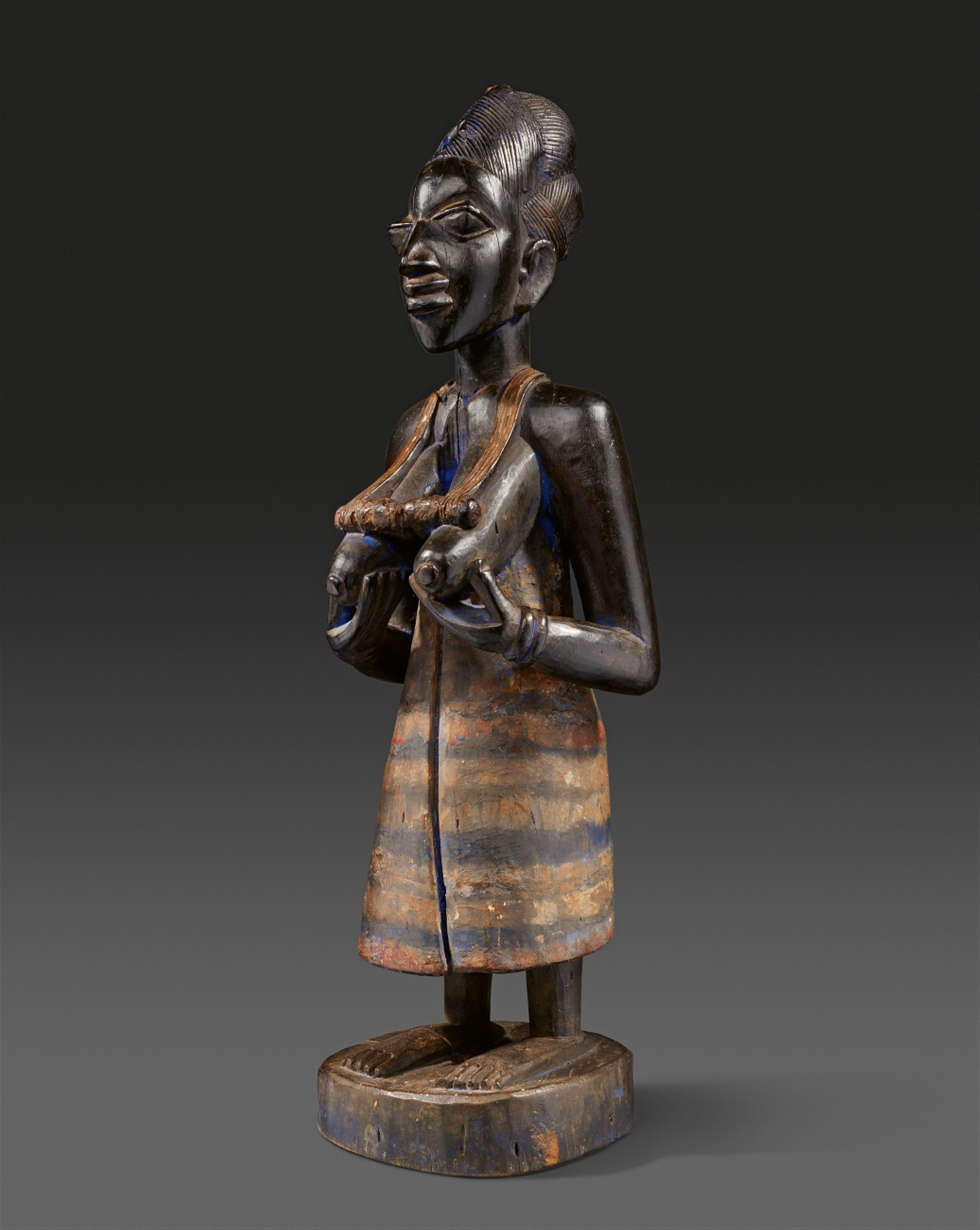 YORUBA FEMALE FIGURE By one of the master carvers of the Igbuke Carving House in Oyo - image-1