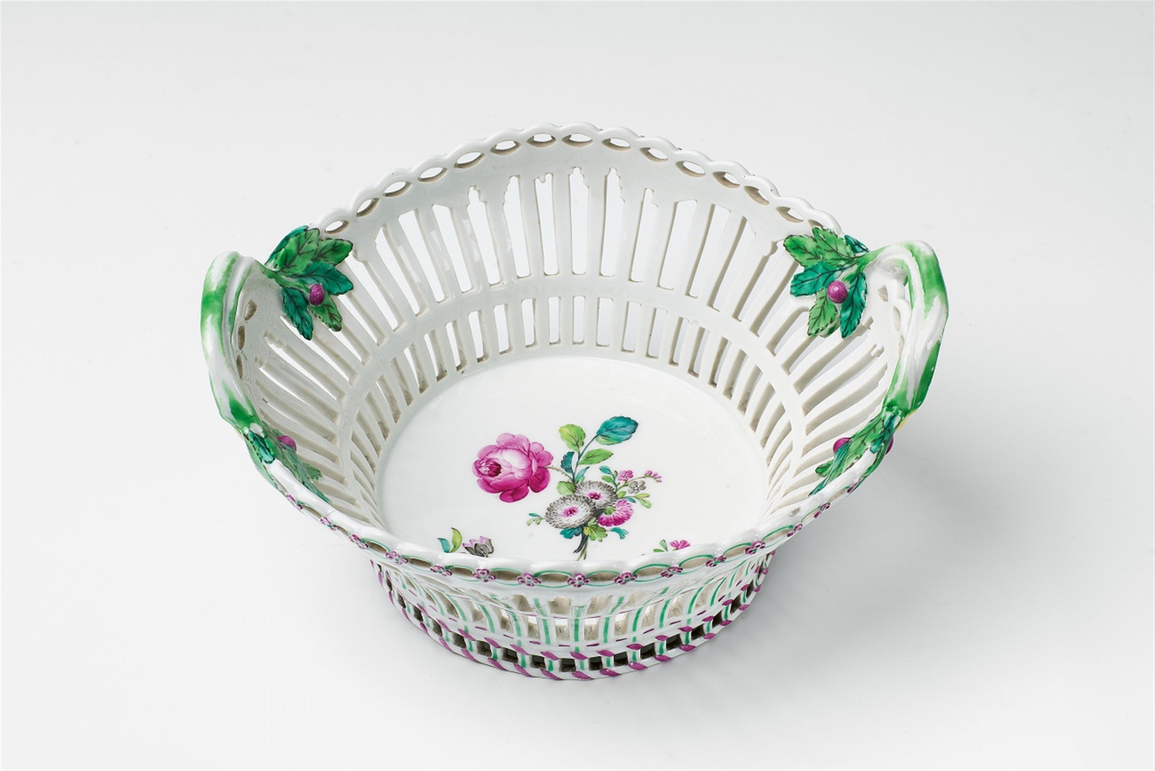 A Berlin KPM porcelain basket with a tri-coloured bouquet - image-1