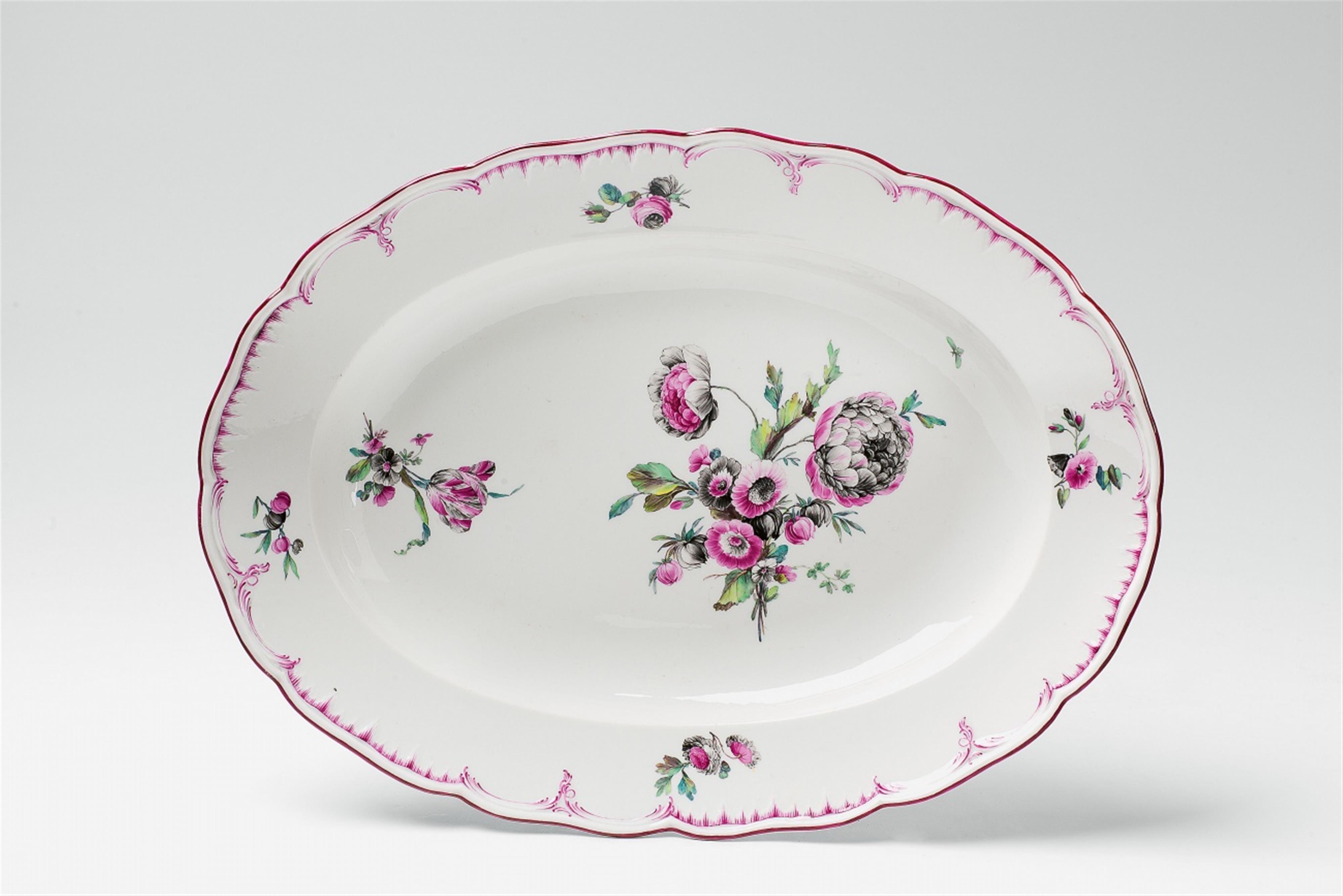 A Berlin KPM oval porcelain platter with tri-coloured flowers - image-1