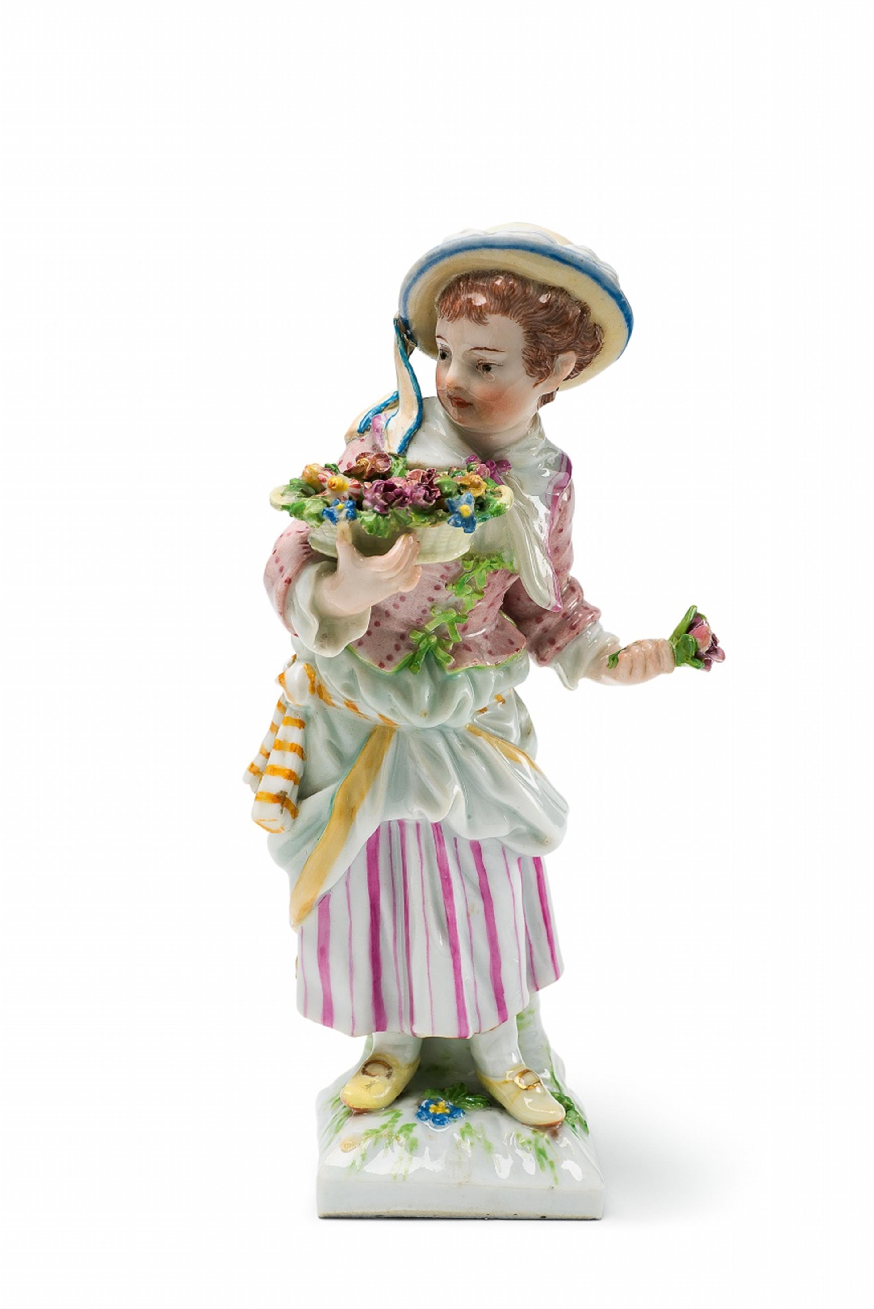 A Berlin KPM porcelain gardener girl with an oval basket - image-1