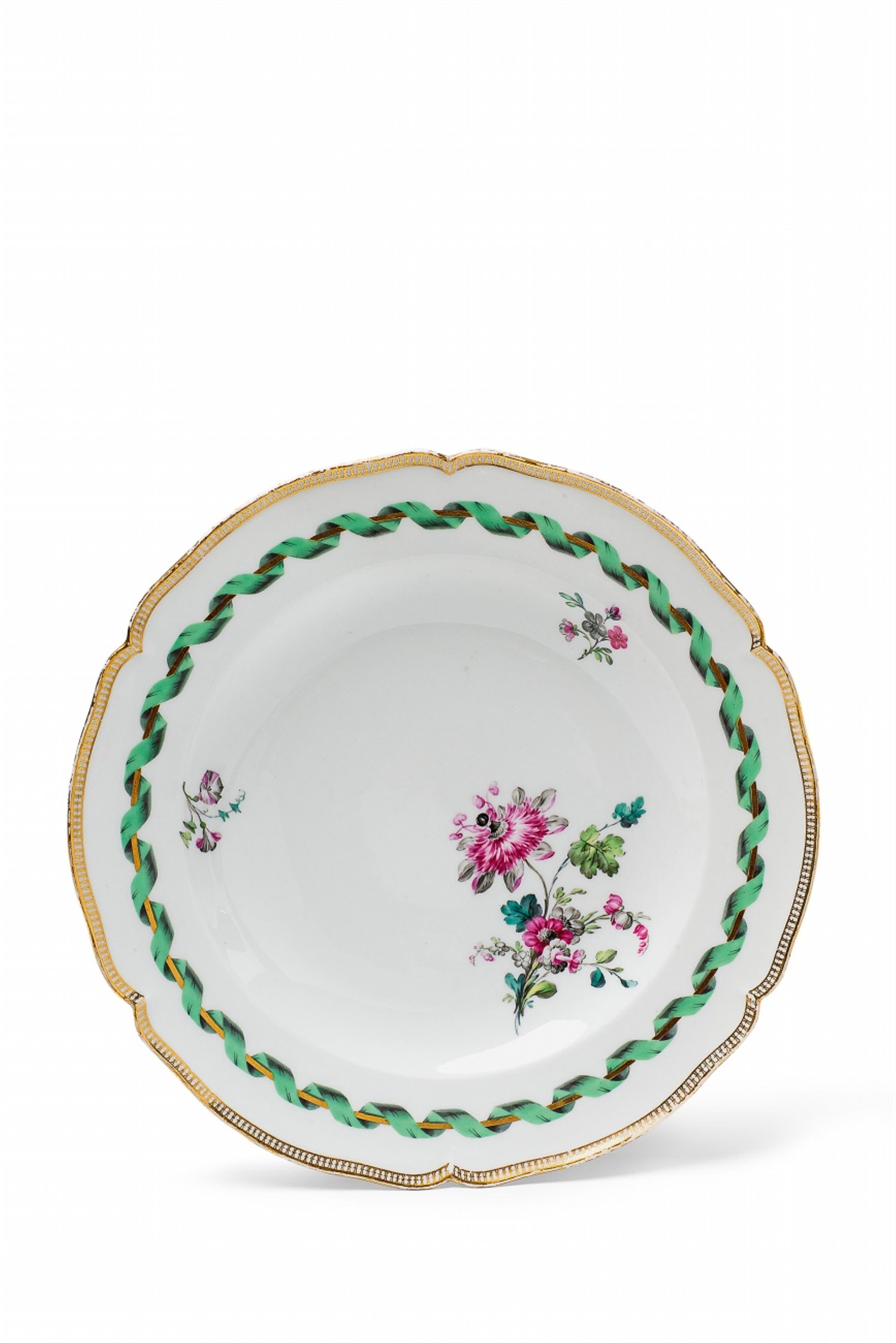 A Berlin KPM porcelain dinner plate with a green ribbon - image-1
