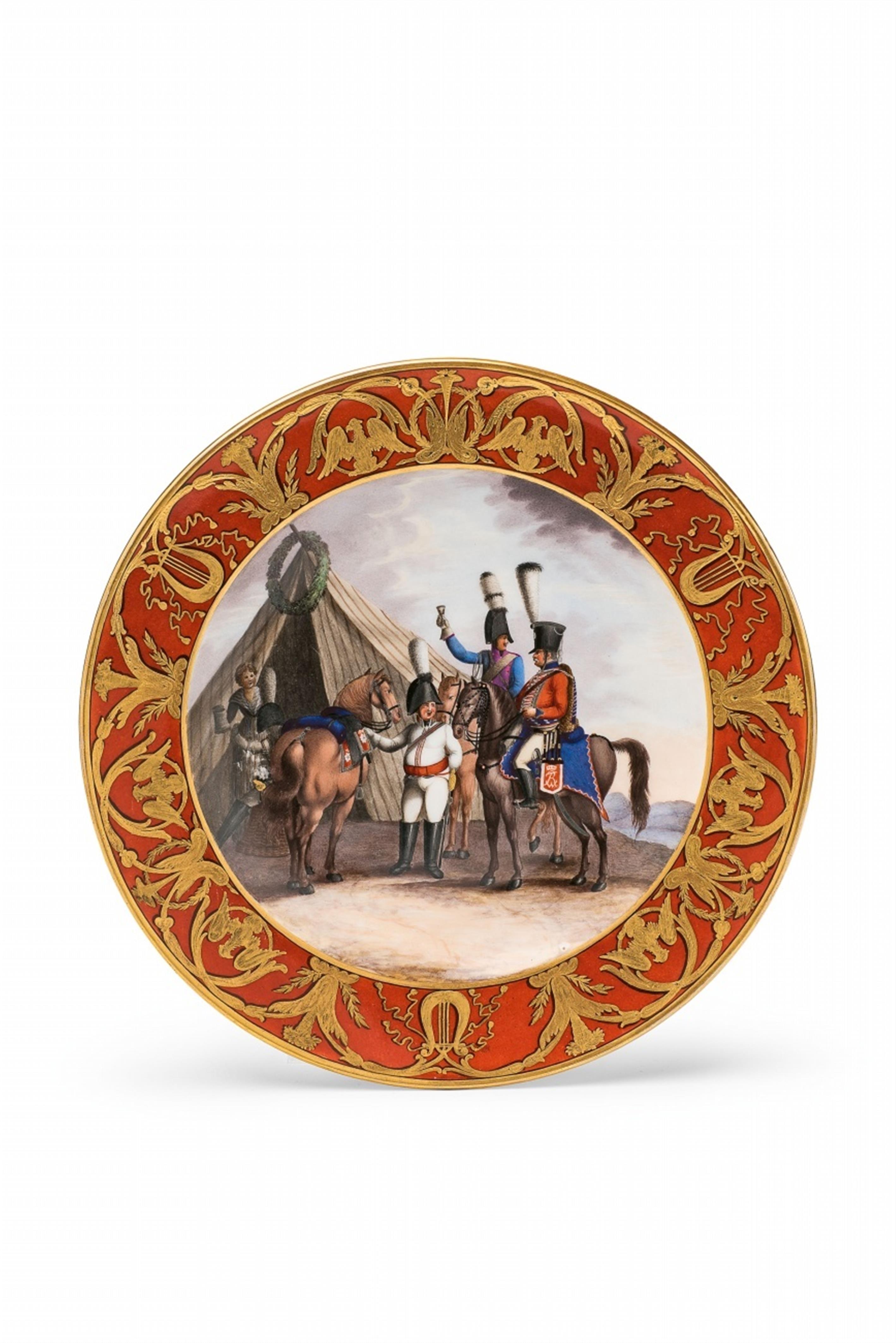 A Berlin KPM porcelain plate with cavalrymen at an encampment - image-1