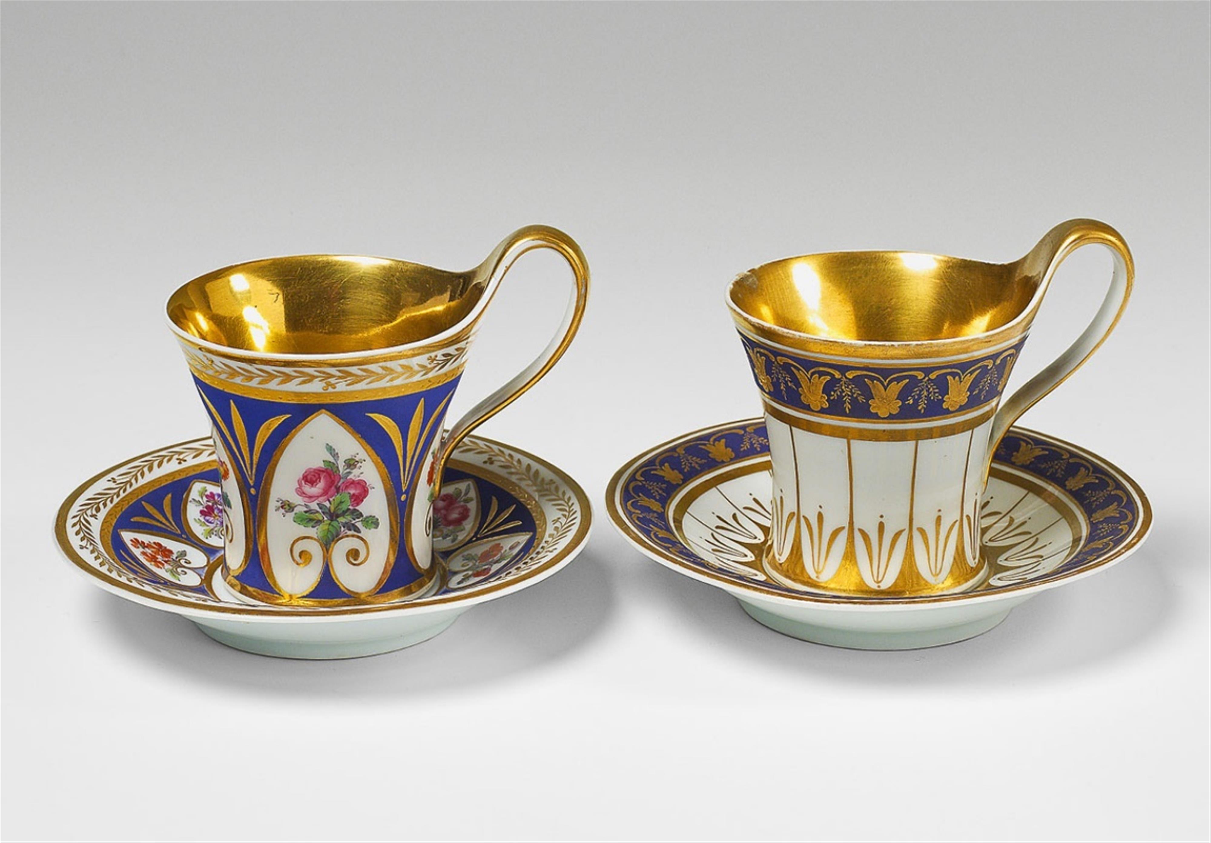 Two Berlin KPM porcelain teacups and saucers - image-1