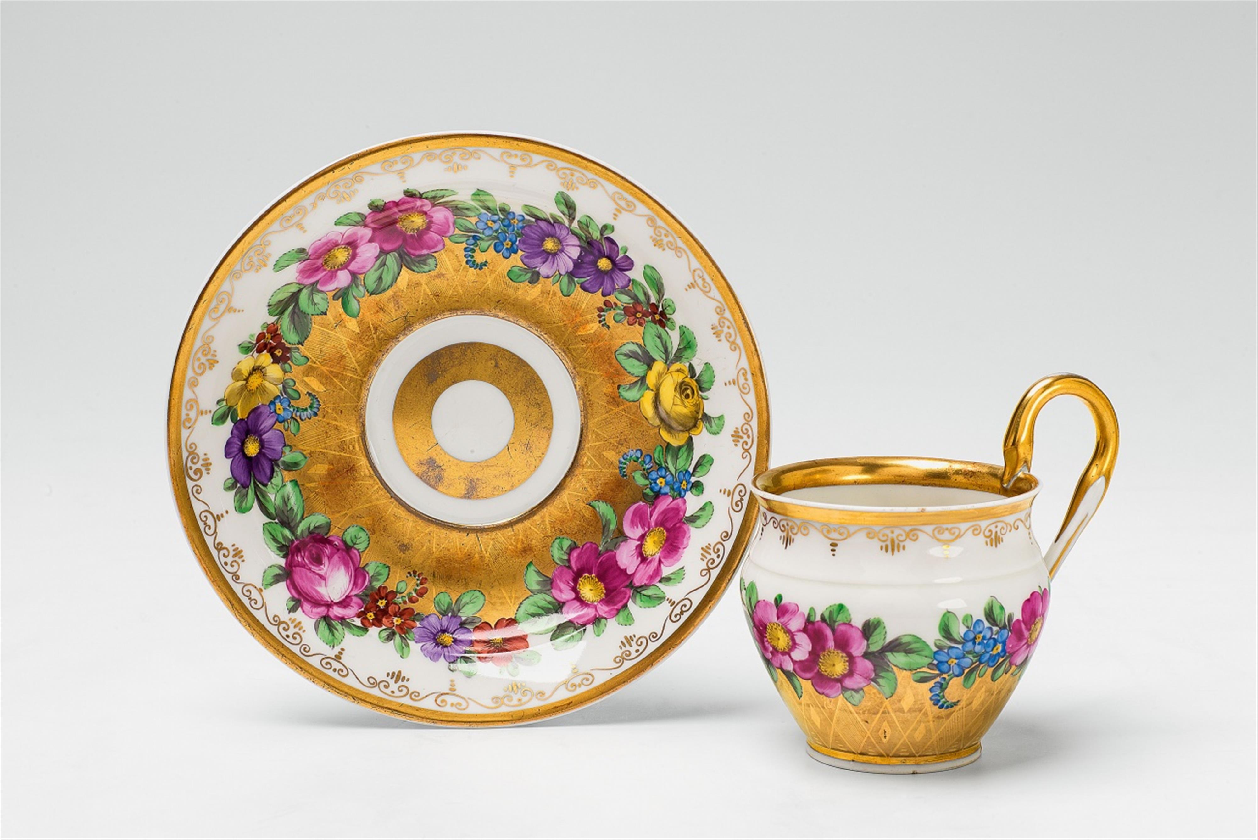 A Berlin KPM porcelain cup with a floral wreath - image-1