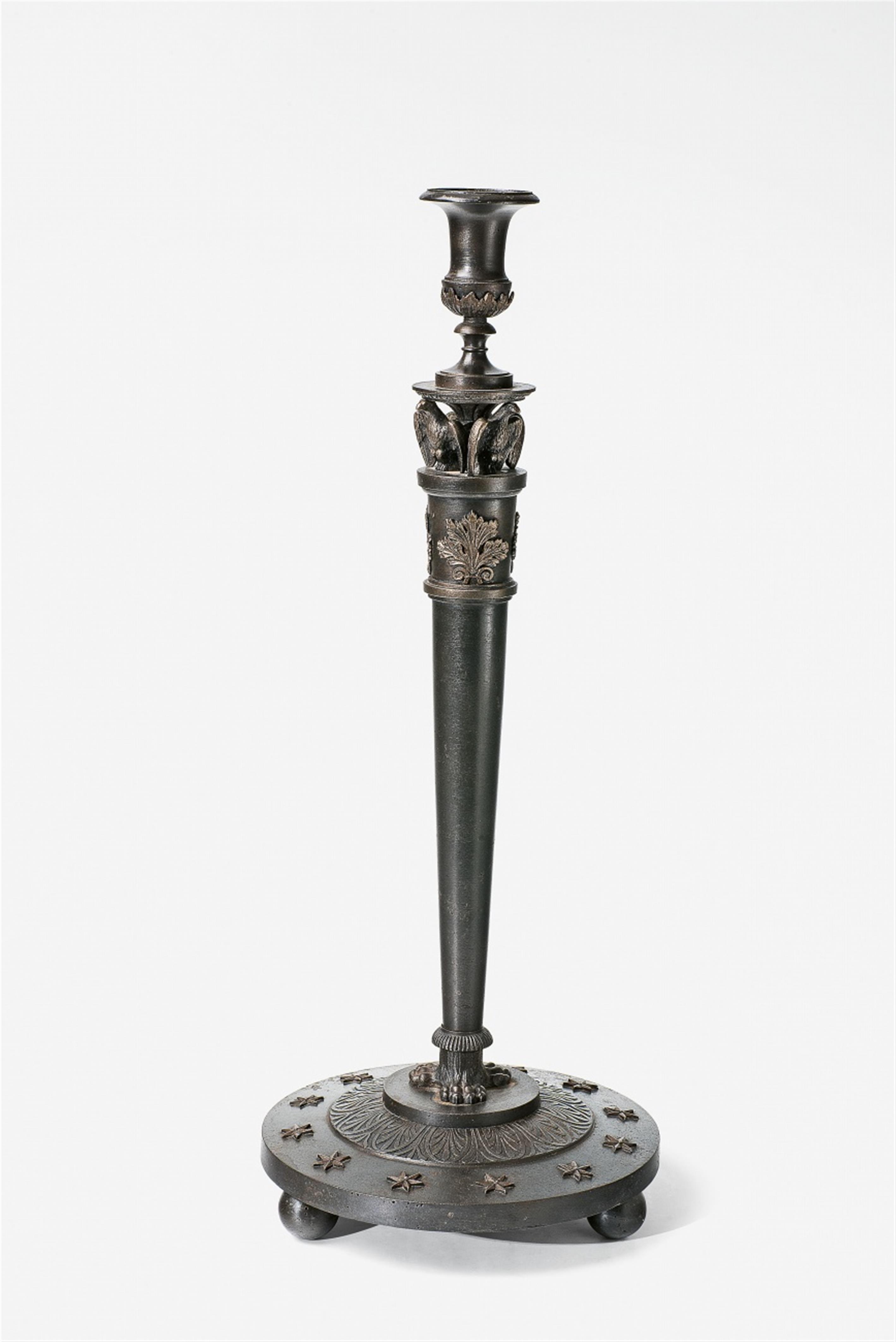 A cast iron altar candlestick with eagles - image-1