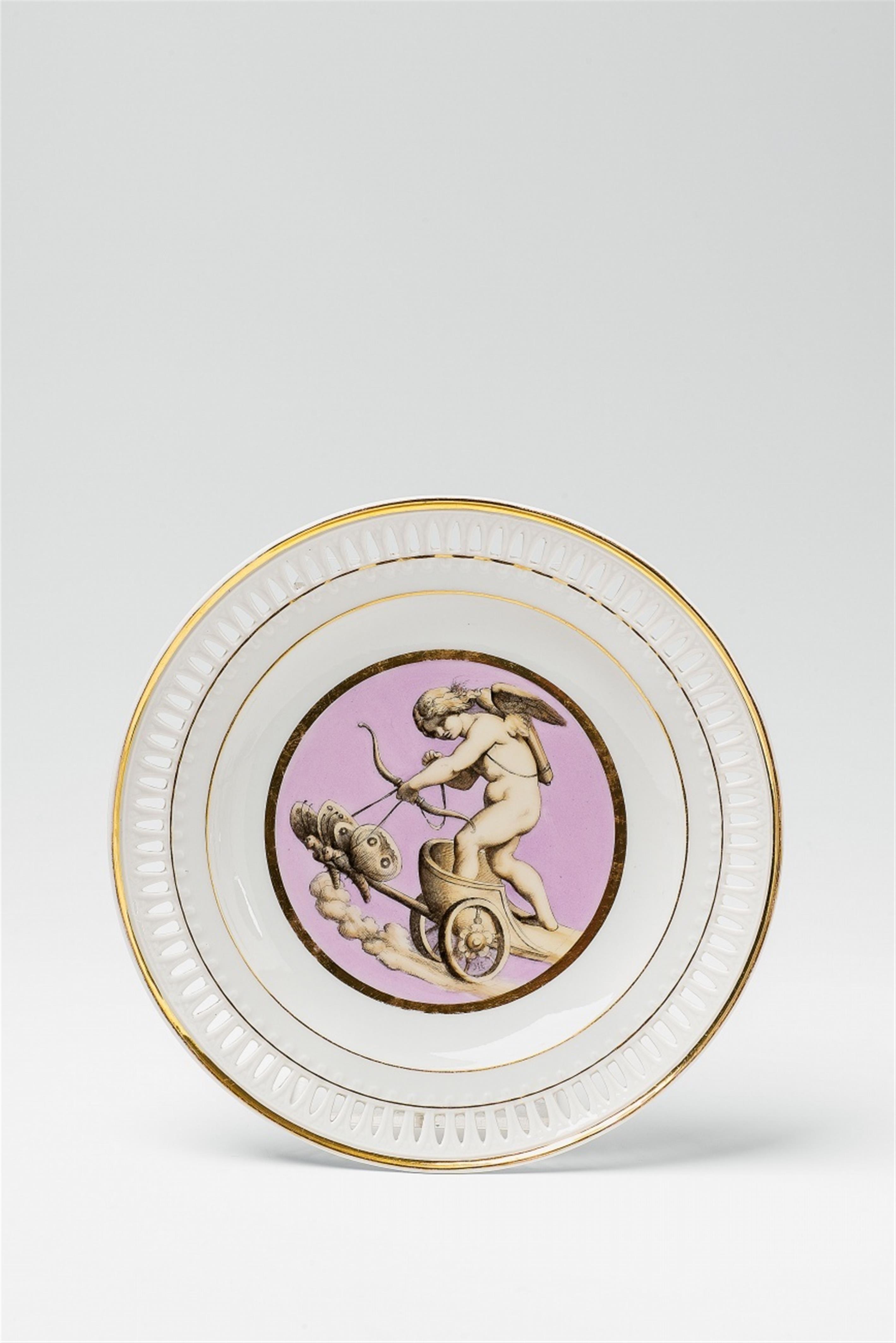 A Berlin KPM porcelain dessert plate with Cupid in his chariot - image-1