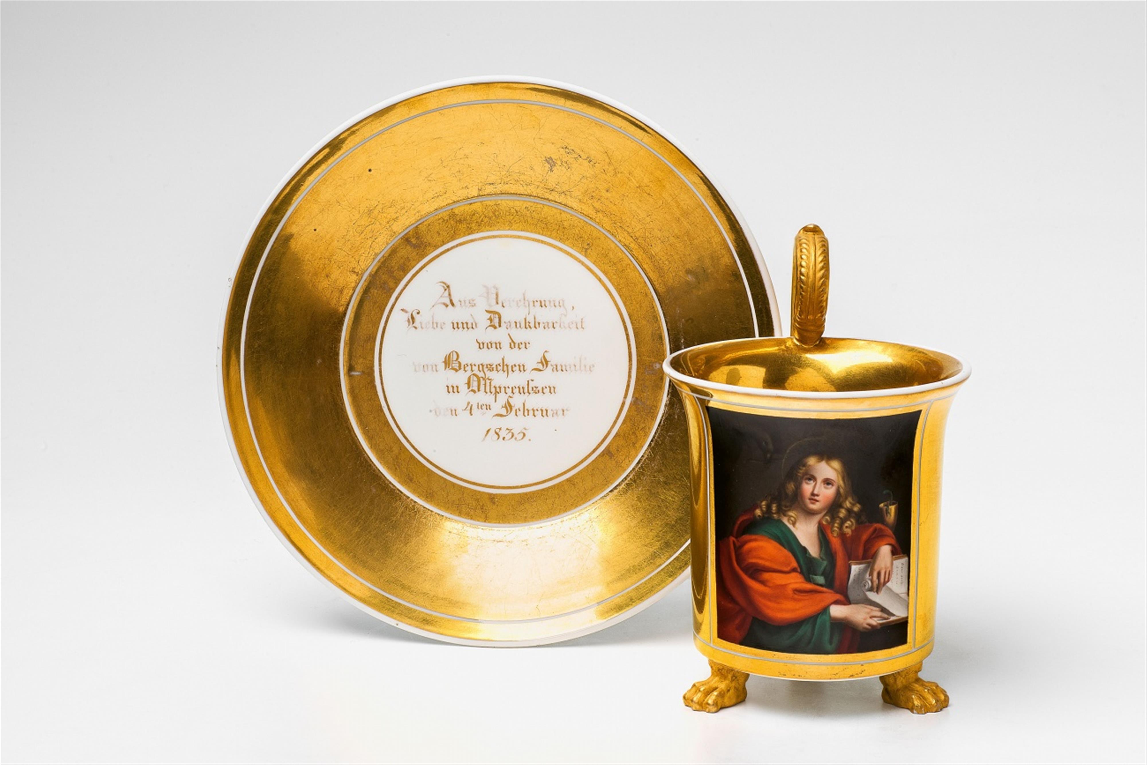 A Berlin KPM porcelain cup with Saint John the Evangelist - image-1