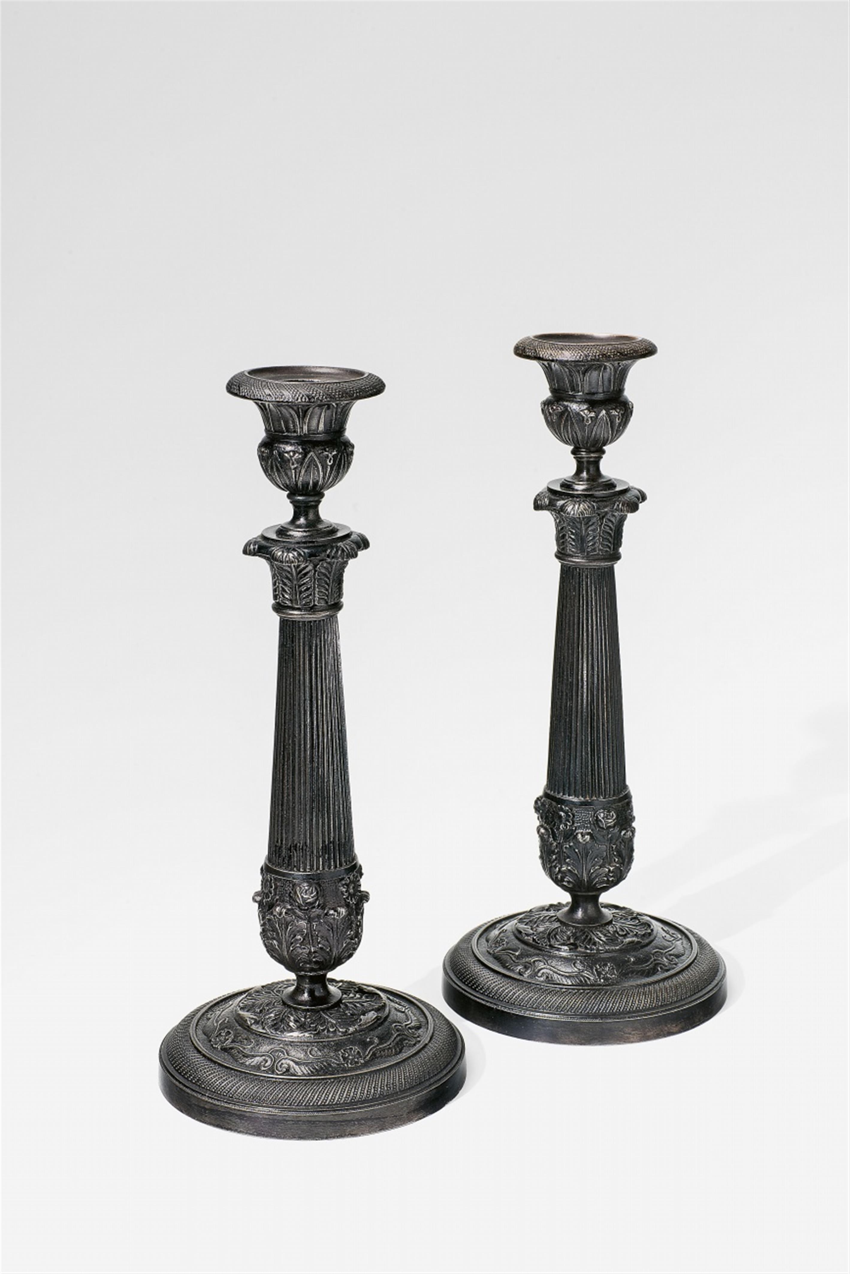 A pair of cast iron Biedermeier candlesticks - image-1