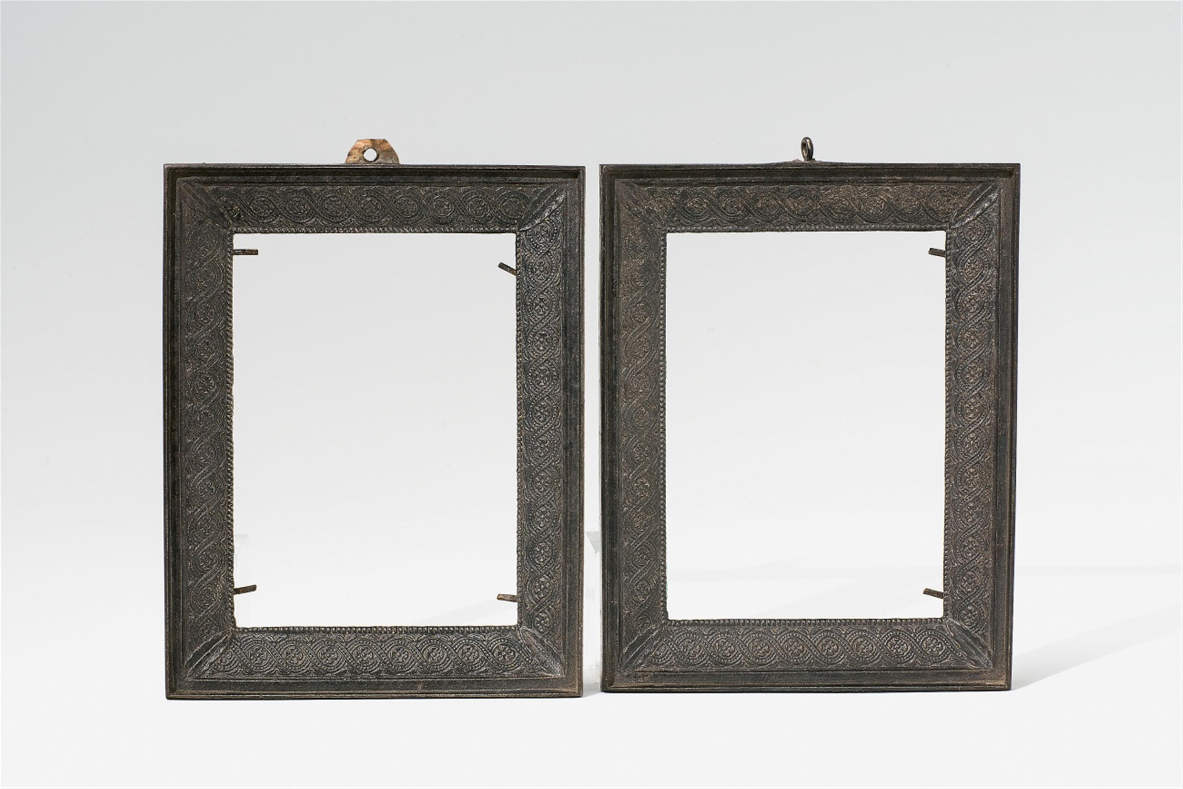 A pair of cast iron miniature frames - image-1