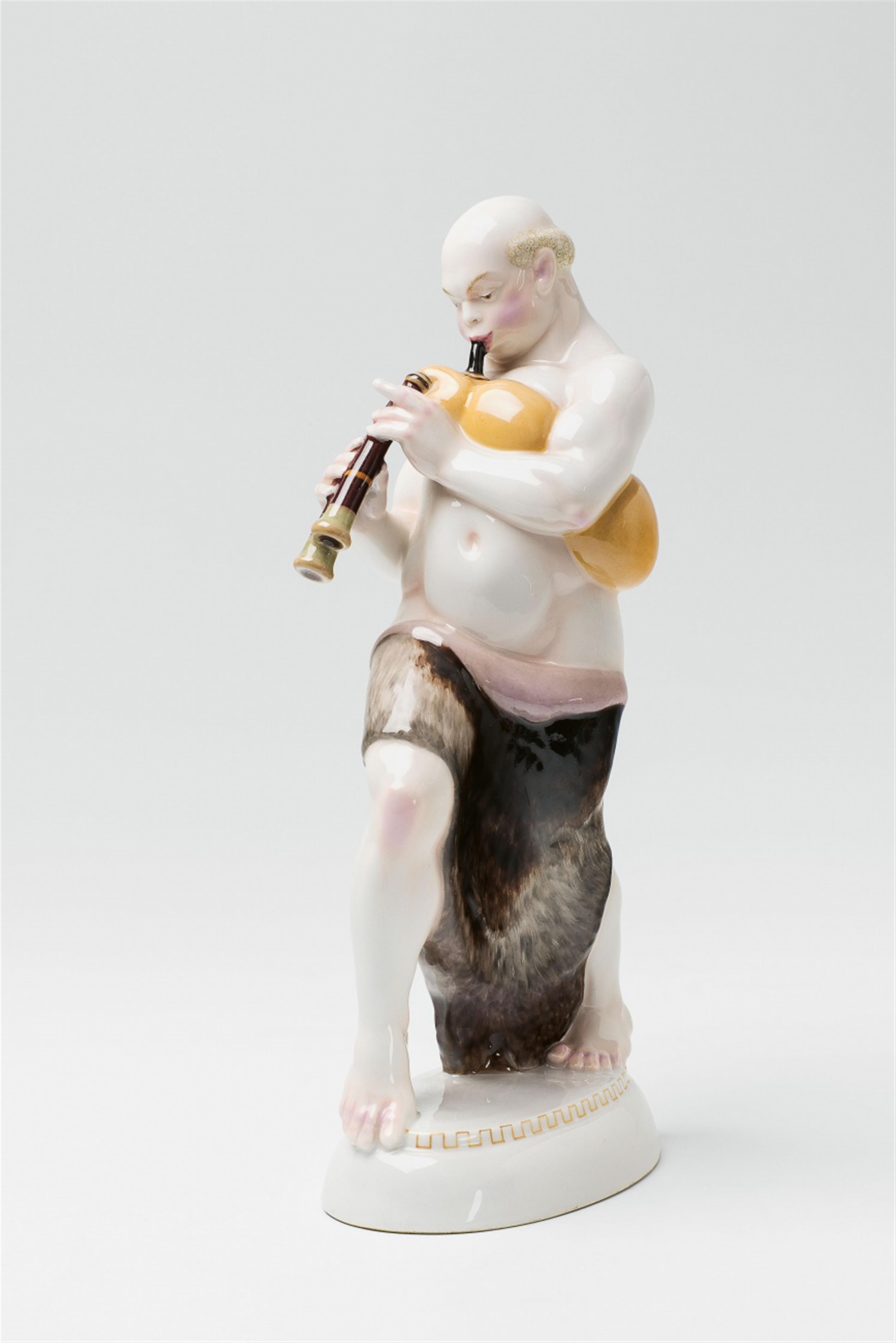 A Berlin KPM porcelain figure of an Arabian playing bagpipes - image-2
