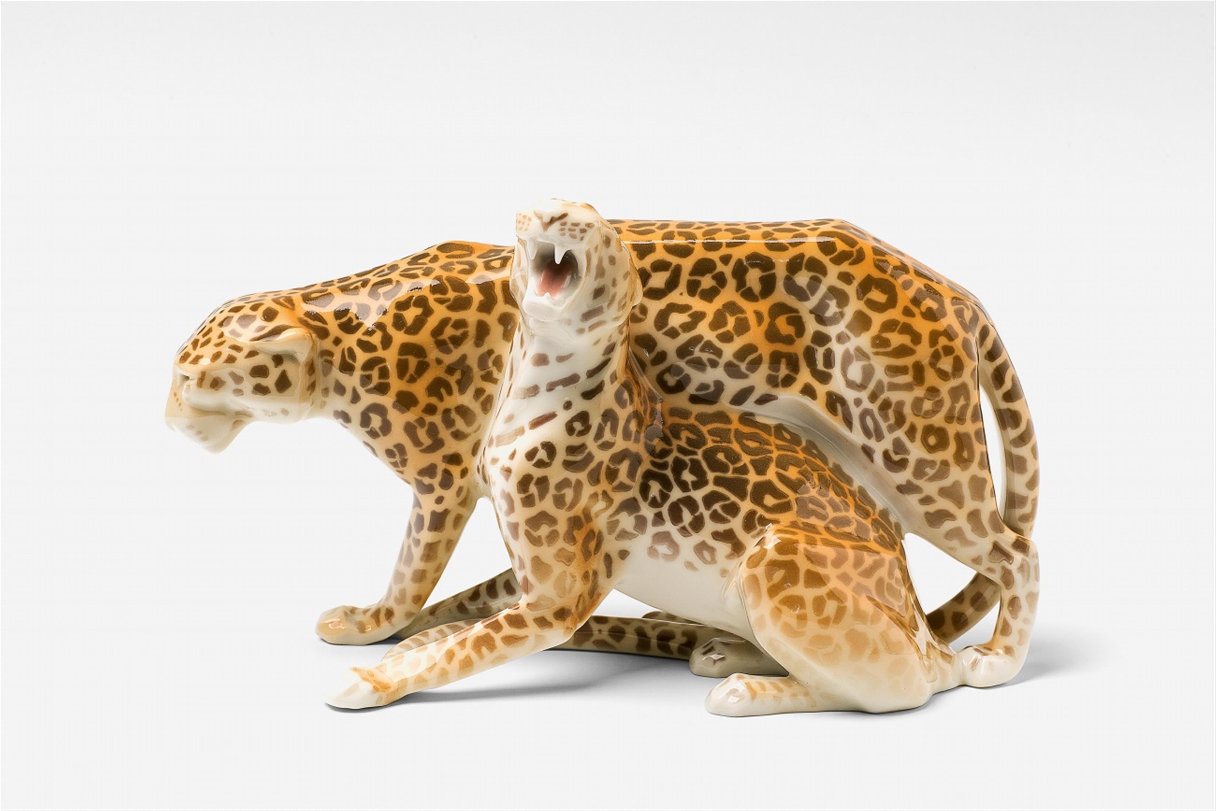 A Berlin KPM porcelain model of two leopards - image-1