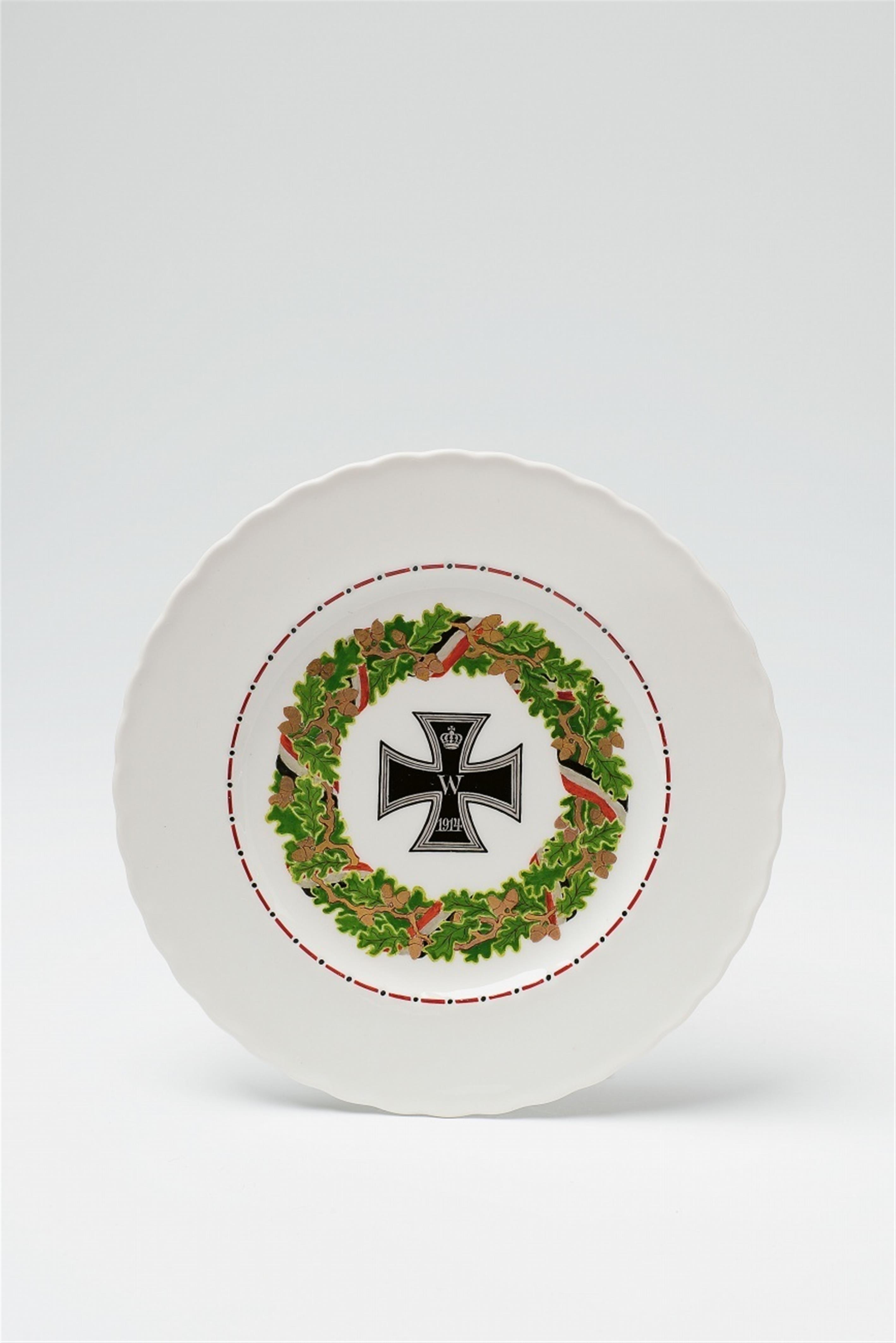 A Berlin KPM porcelain plate with the iron cross - image-1