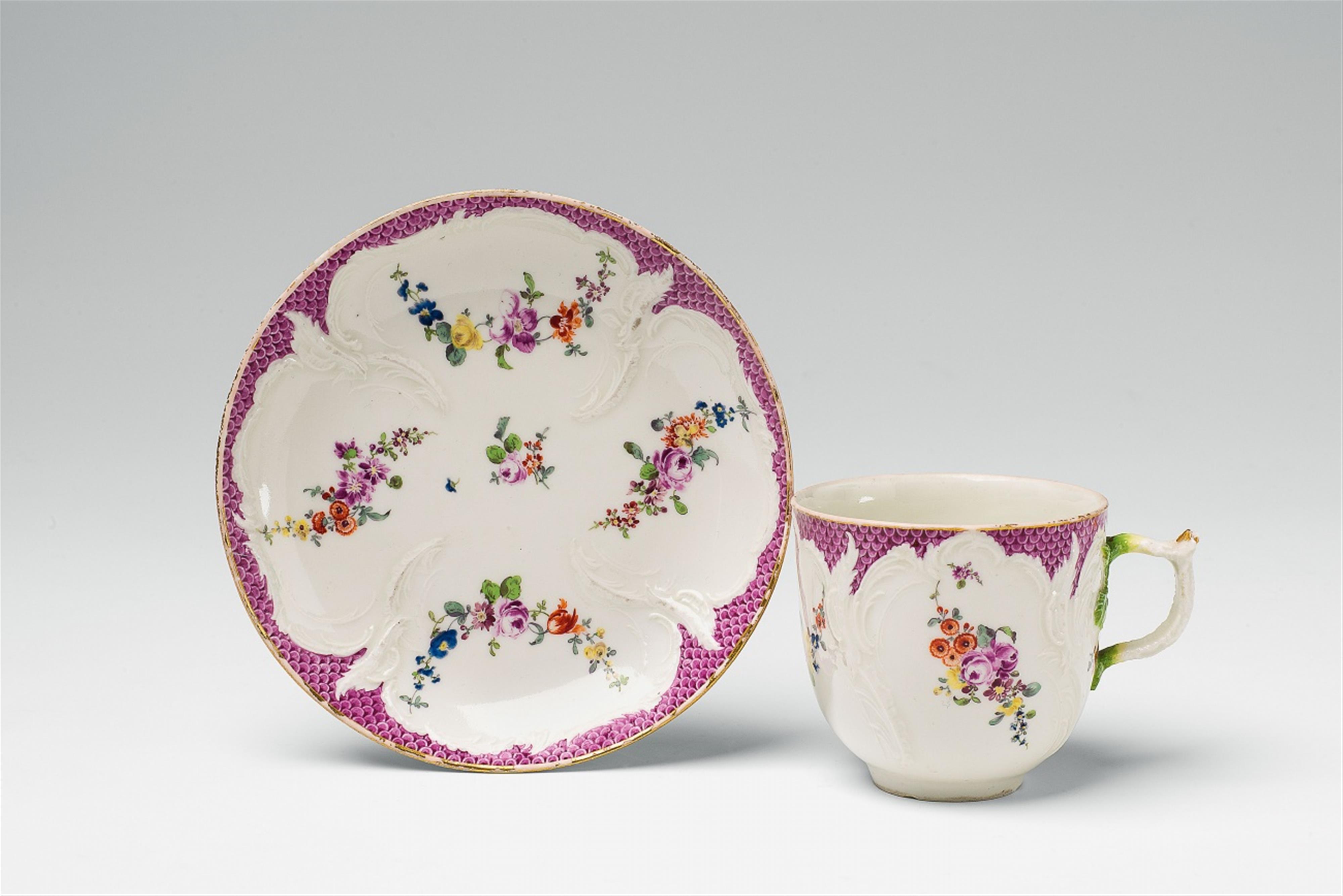 A Berlin KPM porcelain cup from a coffee service with puce mosaic borders - image-1
