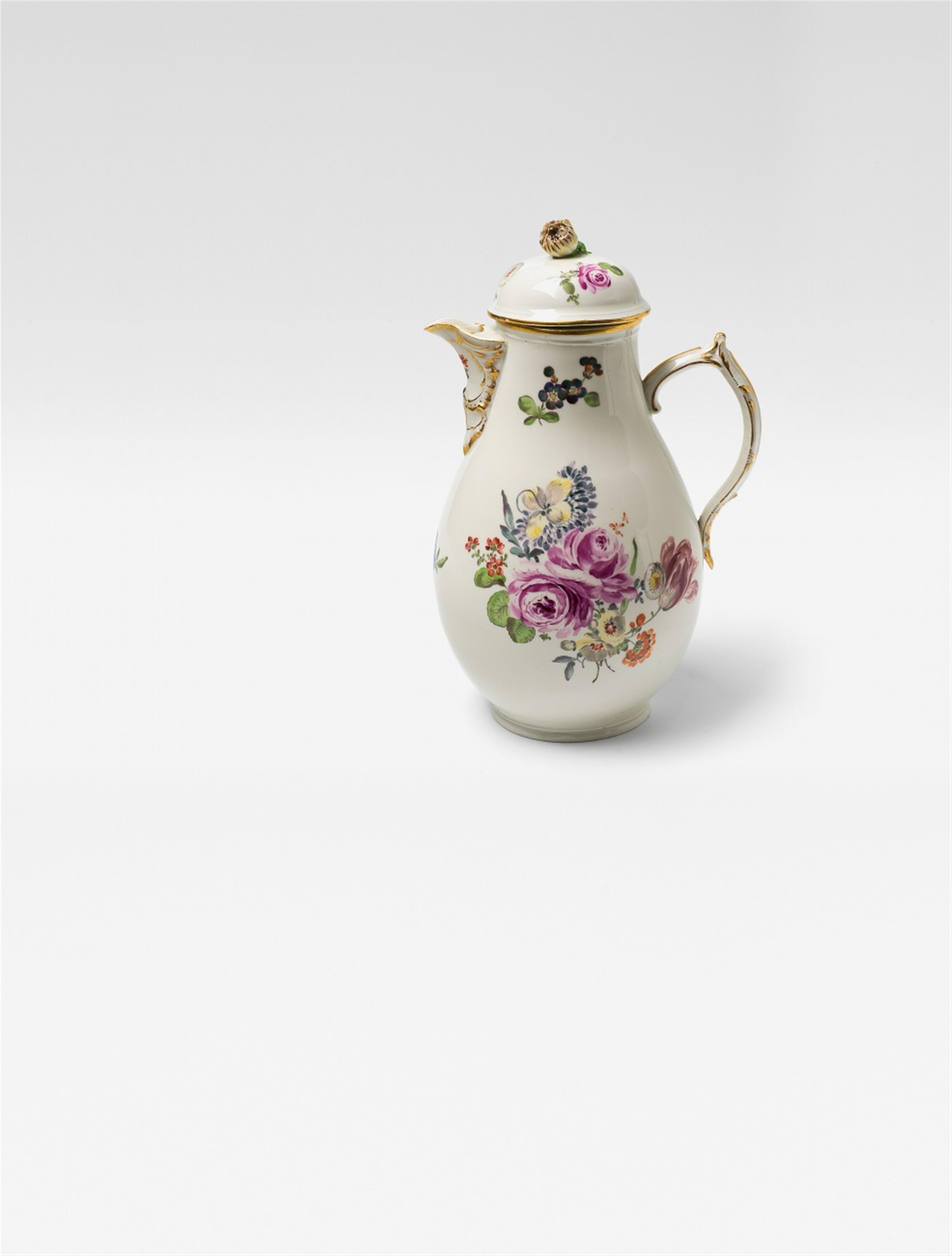 A Berlin KPM porcelain coffee pot with naturalistic floral decor - image-1