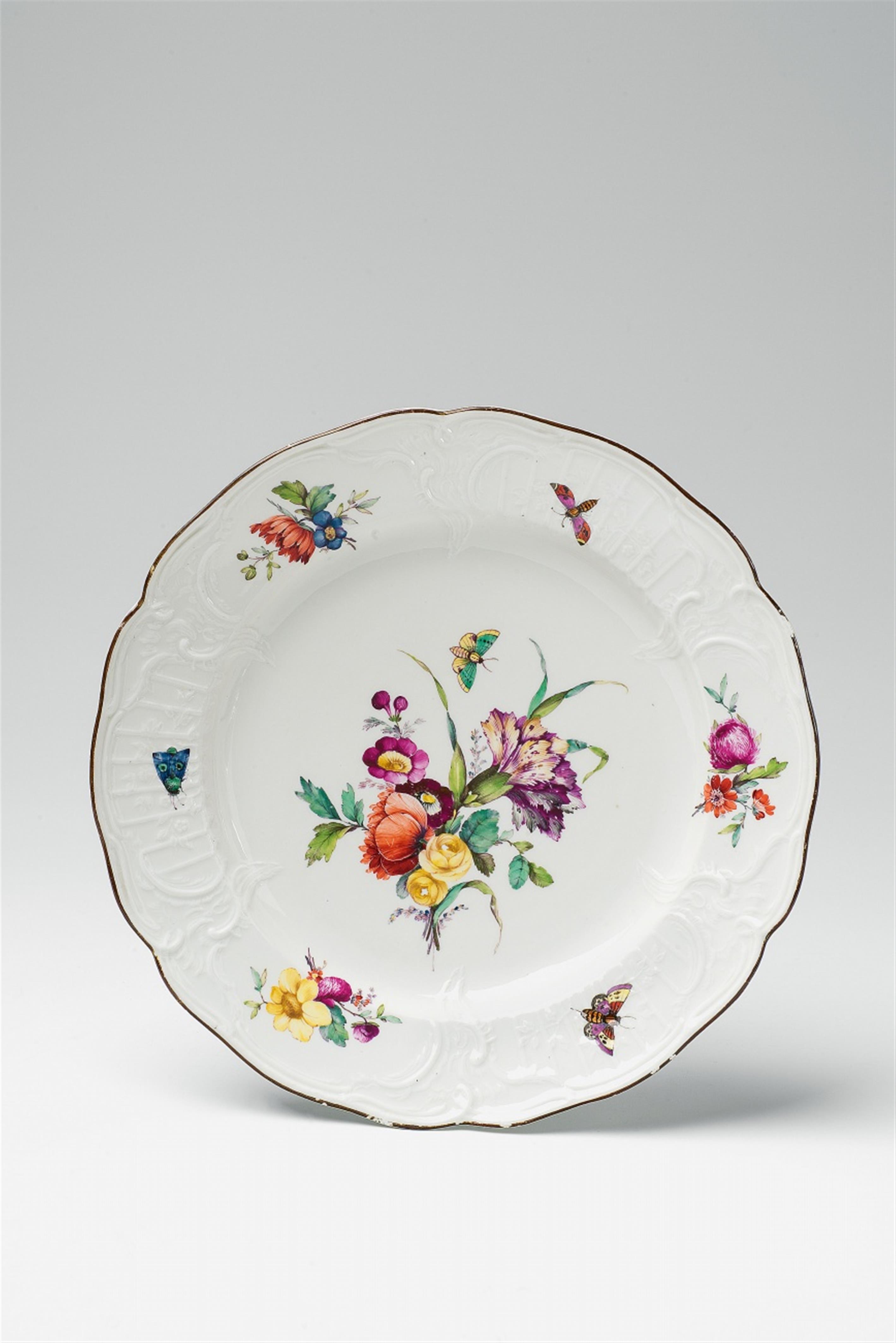 Two Berlin KPM porcelain dinner plates with naturalistic flowers and insects - image-1