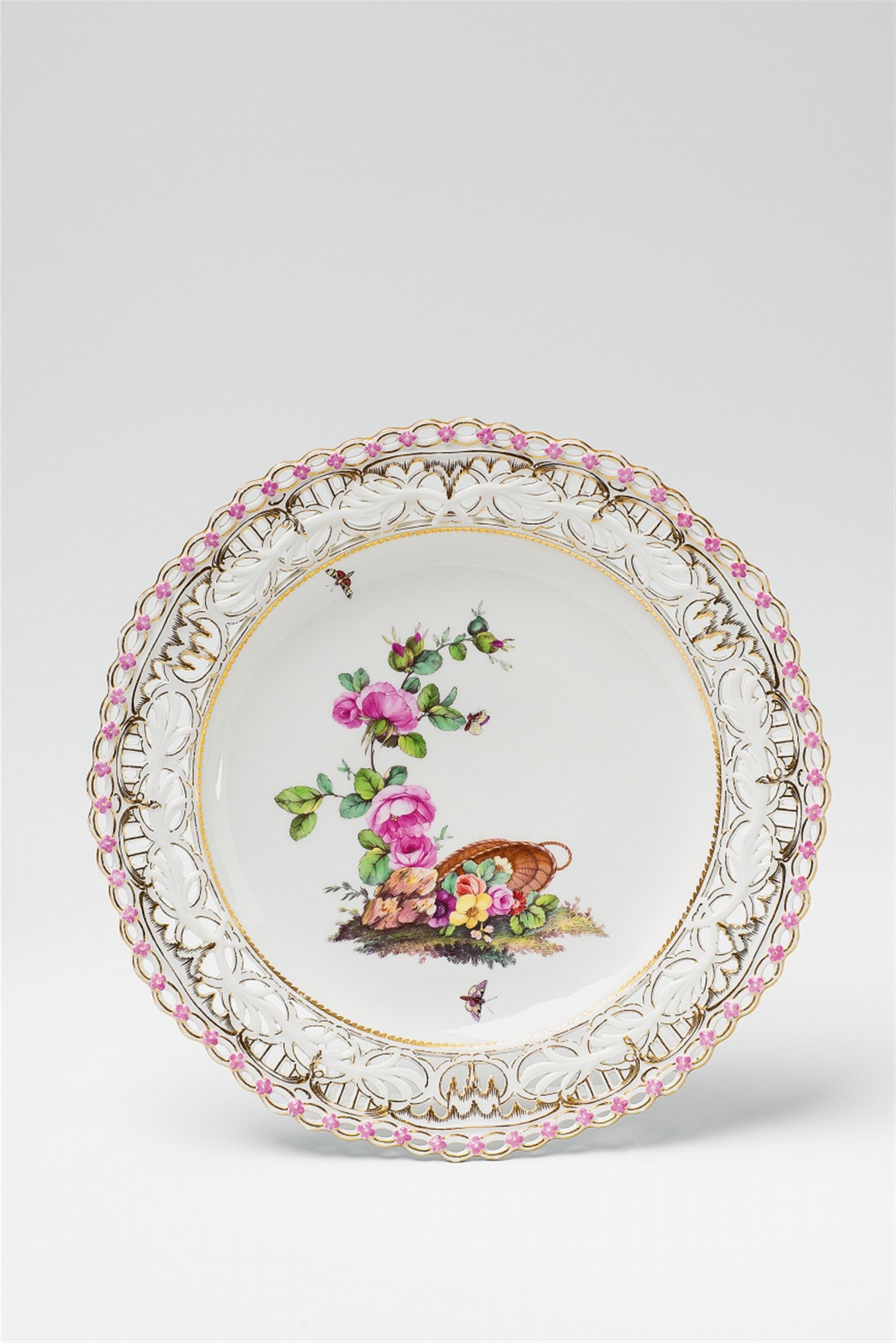 A Berlin KPM porcelain dessert plate with an overturned basket of flowers - image-1