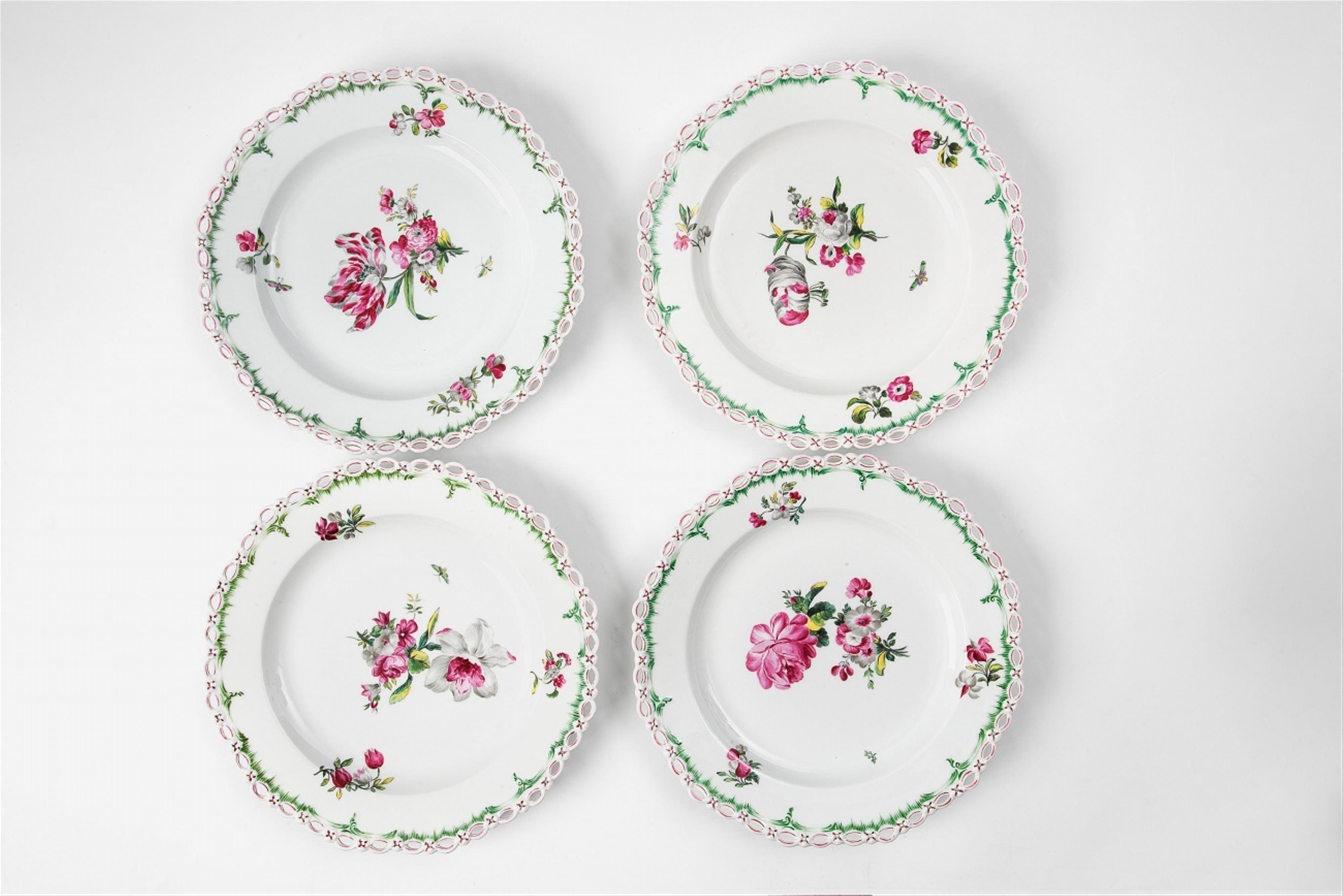 Four Berlin KPM porcelain dessert plates with tri-coloured flowers - image-1