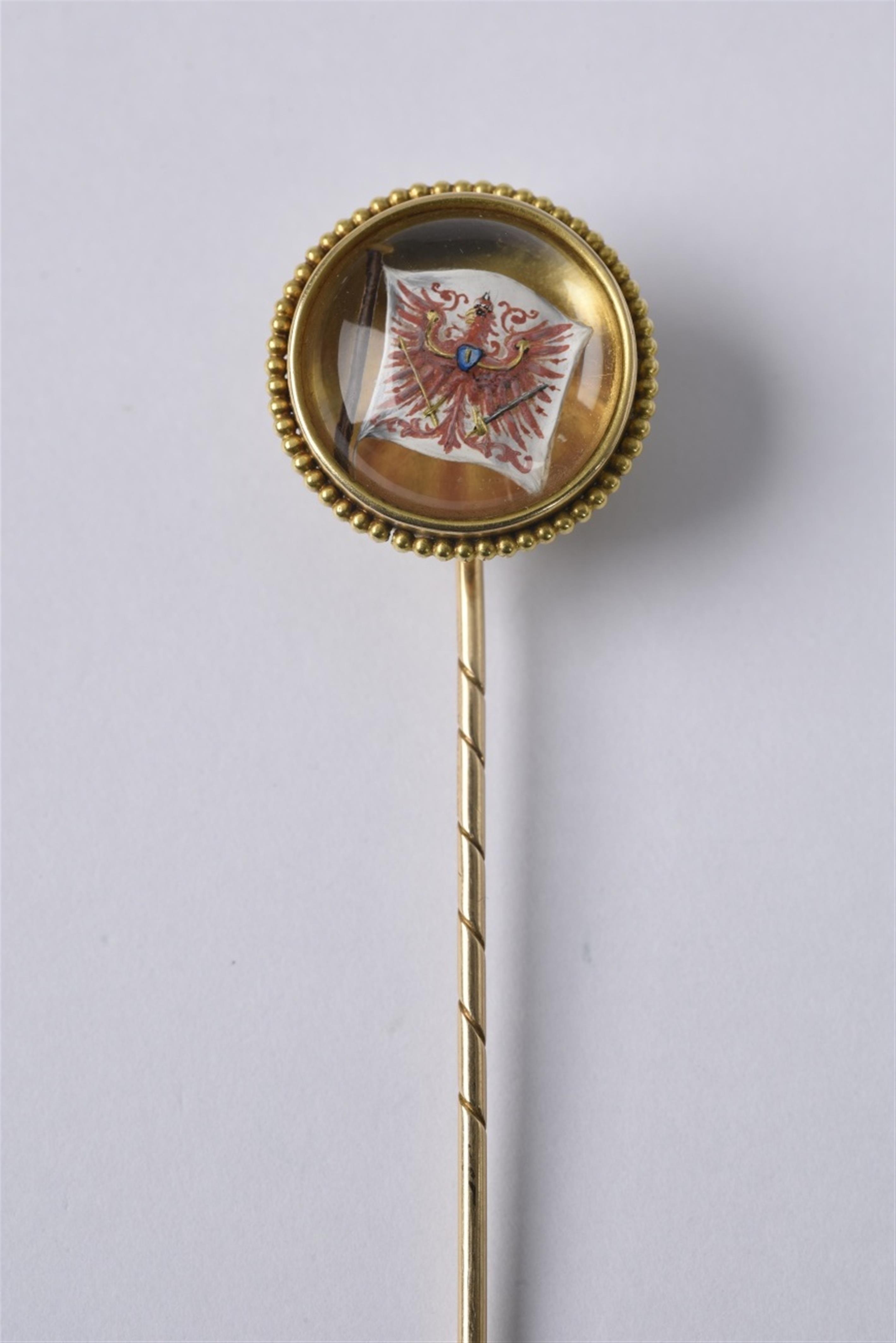 A Brandenburg 14k gold and rock crystal pin - image-1