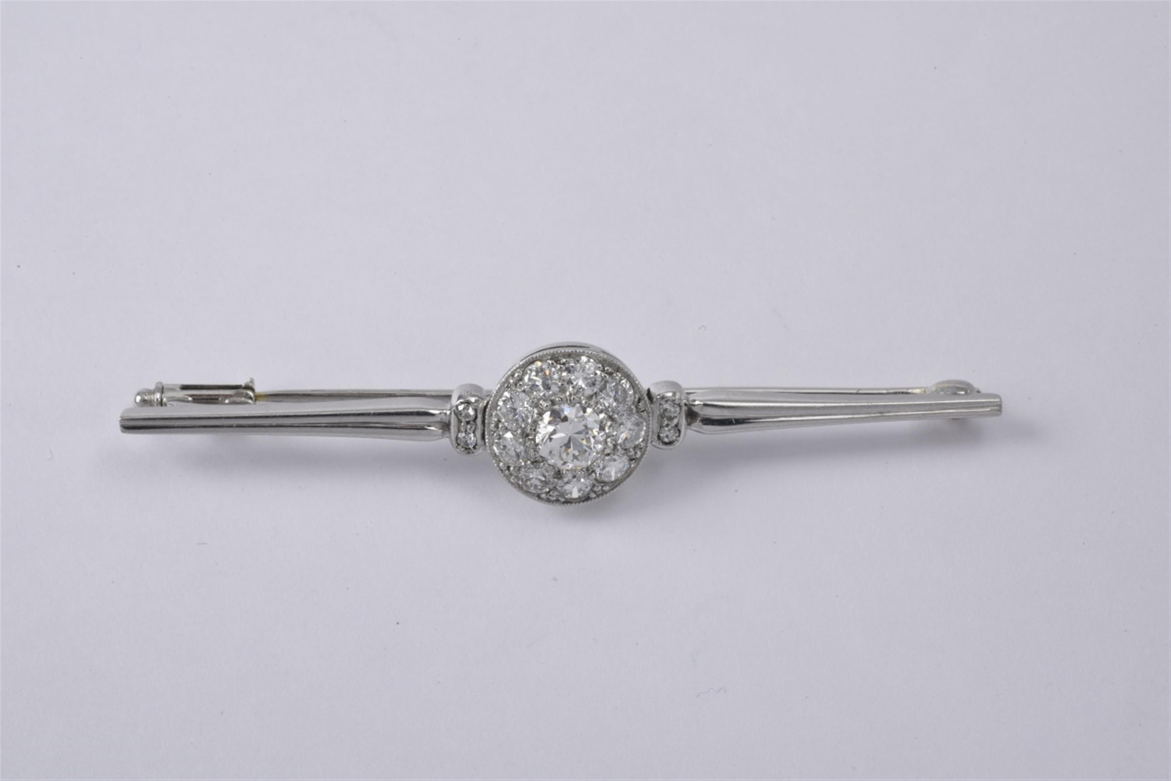 A 14k white gold and diamond pin - image-1