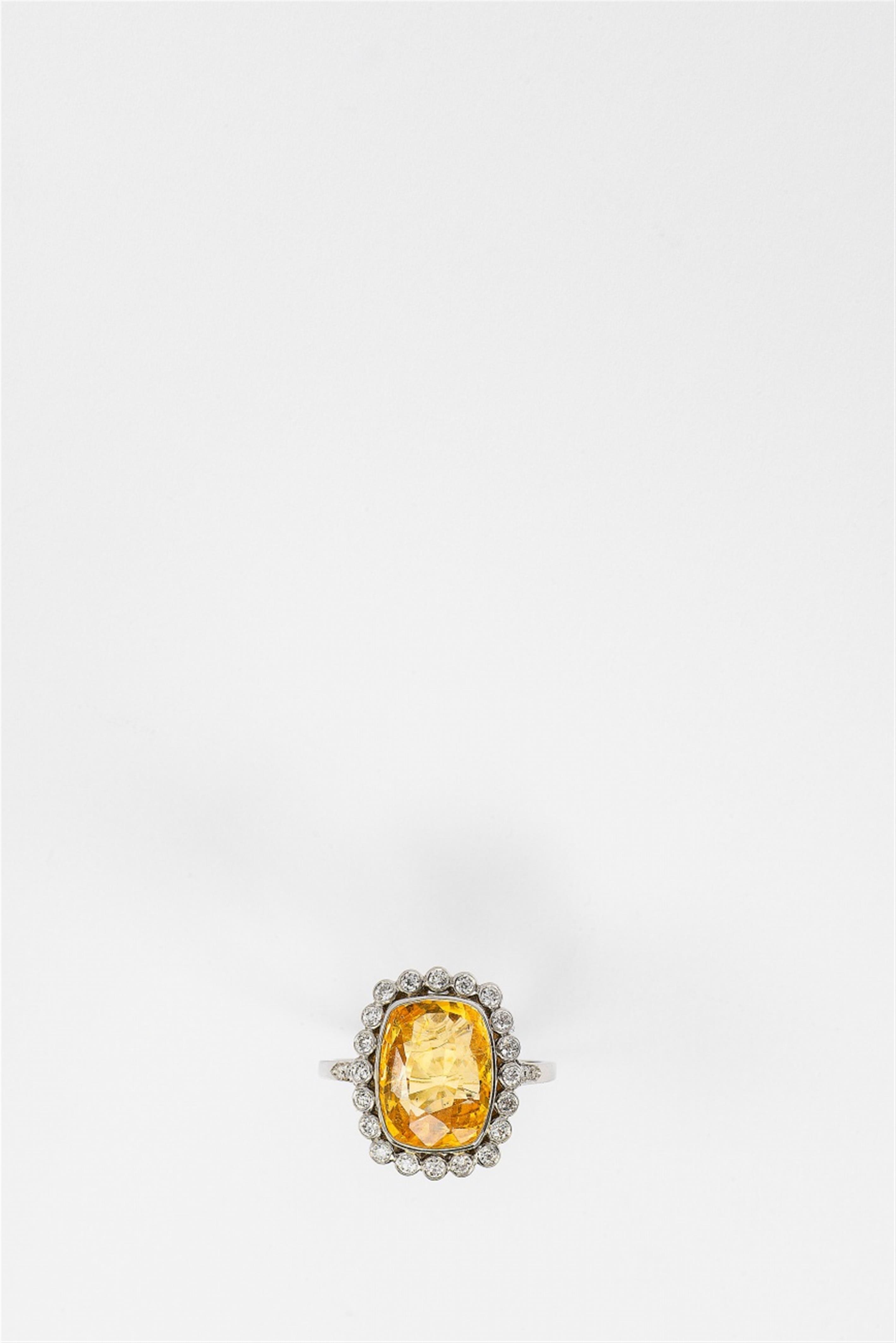 A platinum and natural yellow sapphire ring - image-2