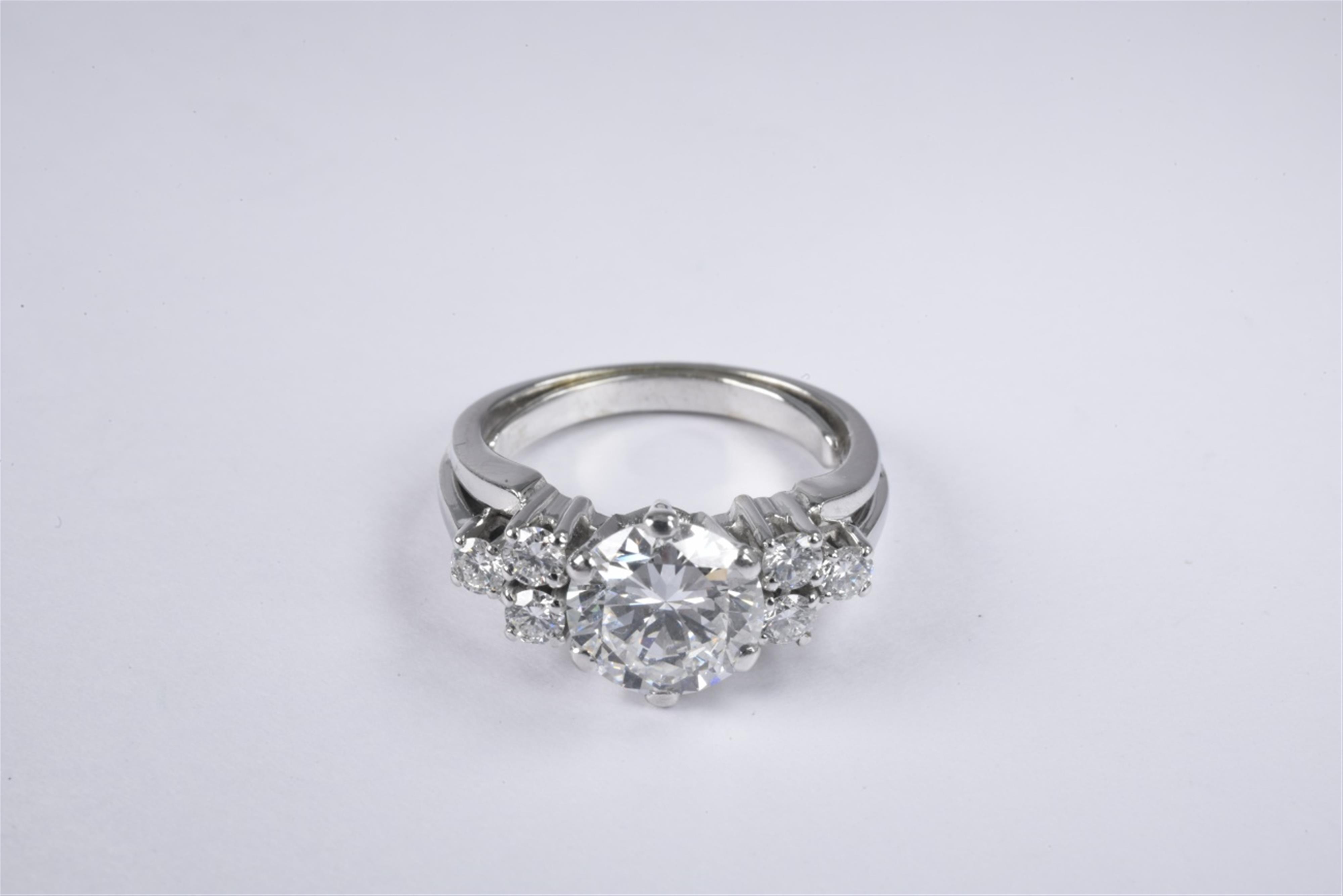 An 18k white gold and diamond ring - image-1