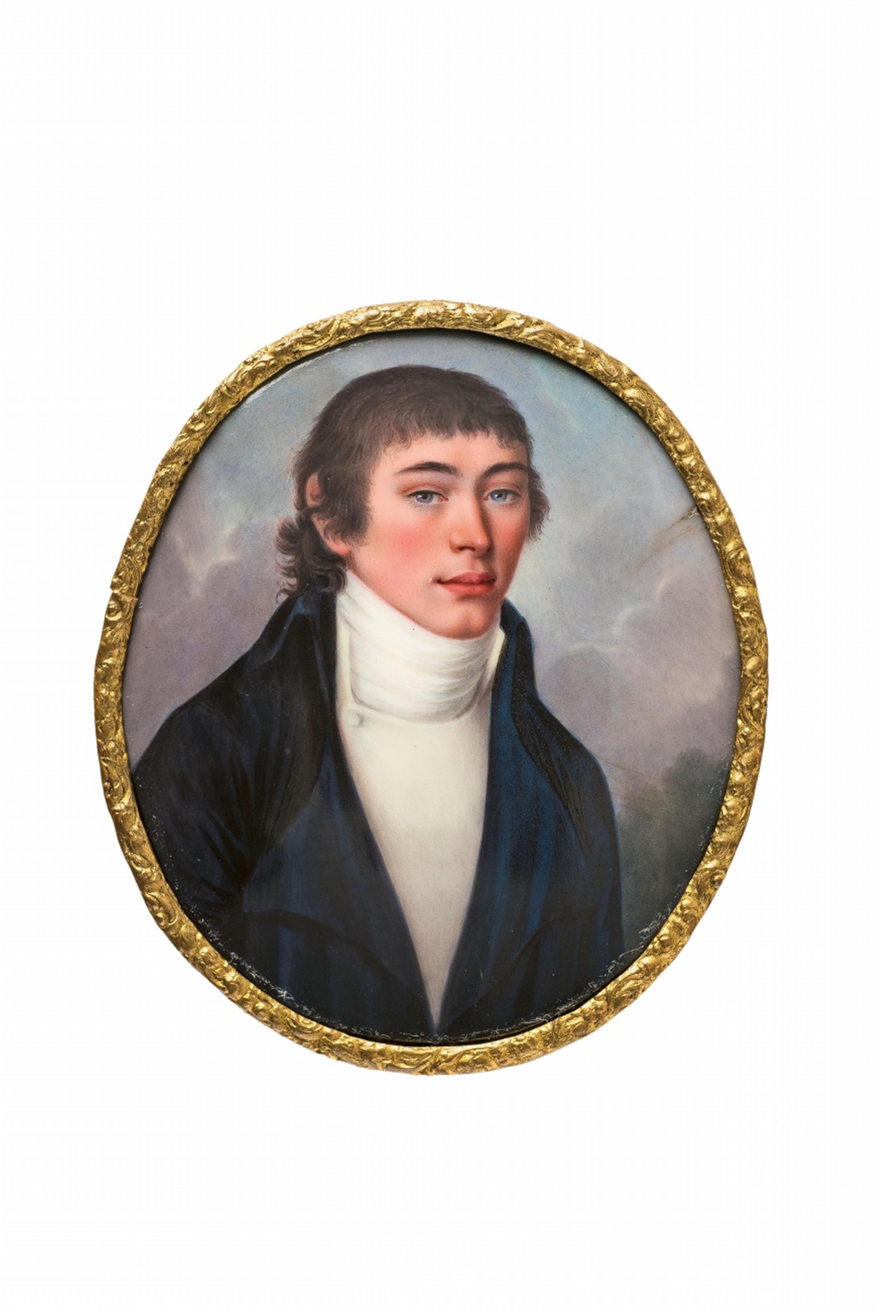 A portrait miniature of a young man in a blue jacket - image-1