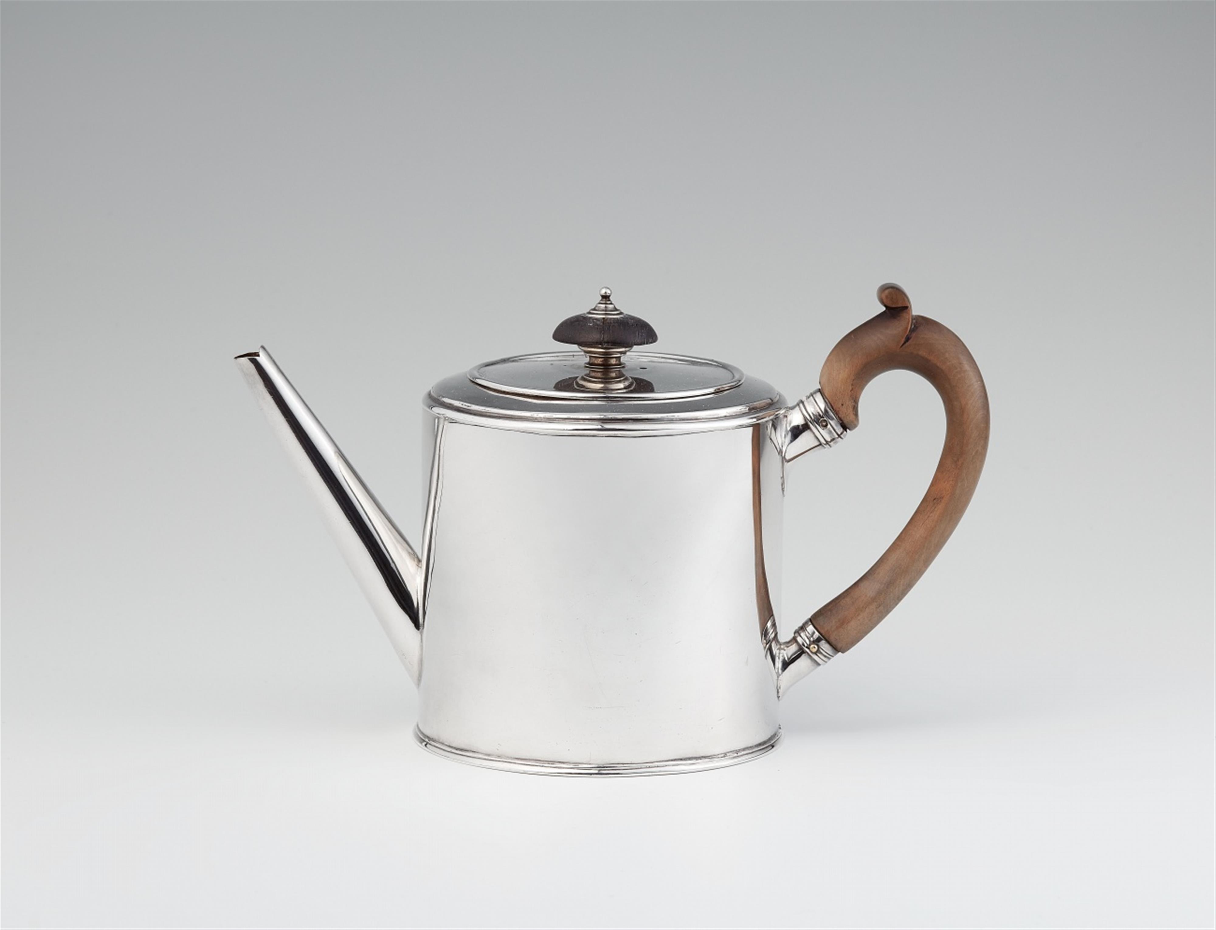 A George III silver teapot - image-1