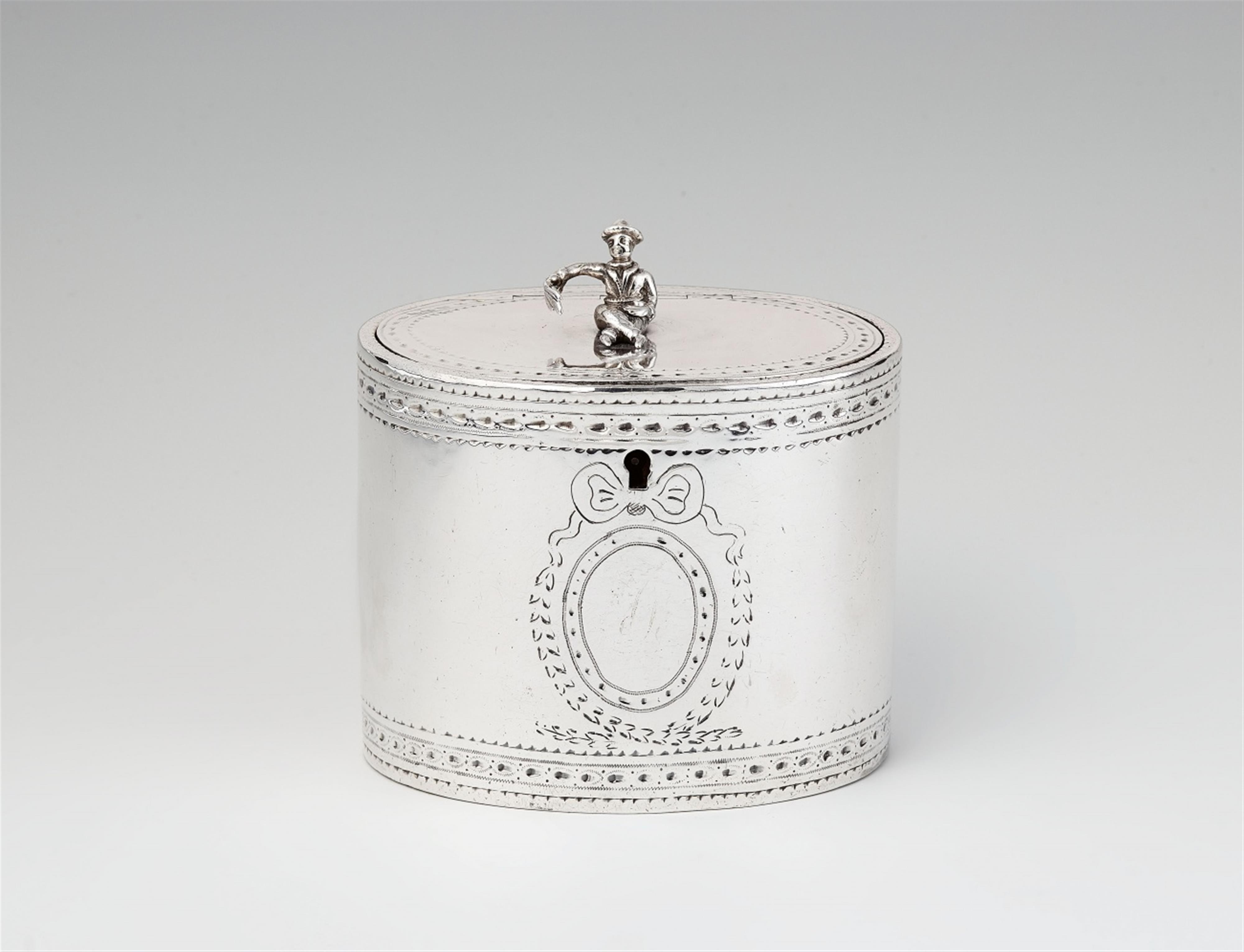 A George III silver tea caddy - image-1