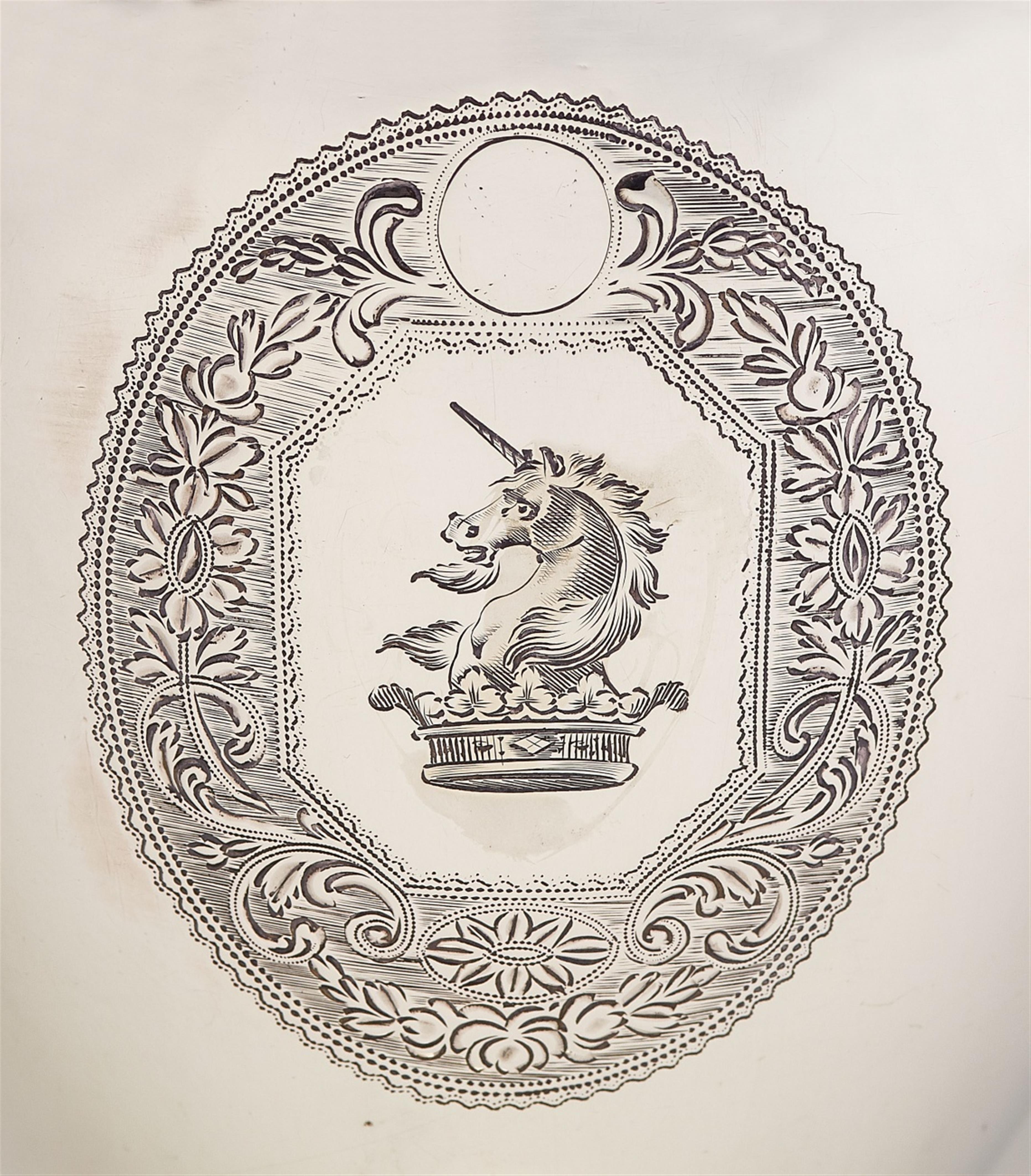 A George III silver water jug - image-2