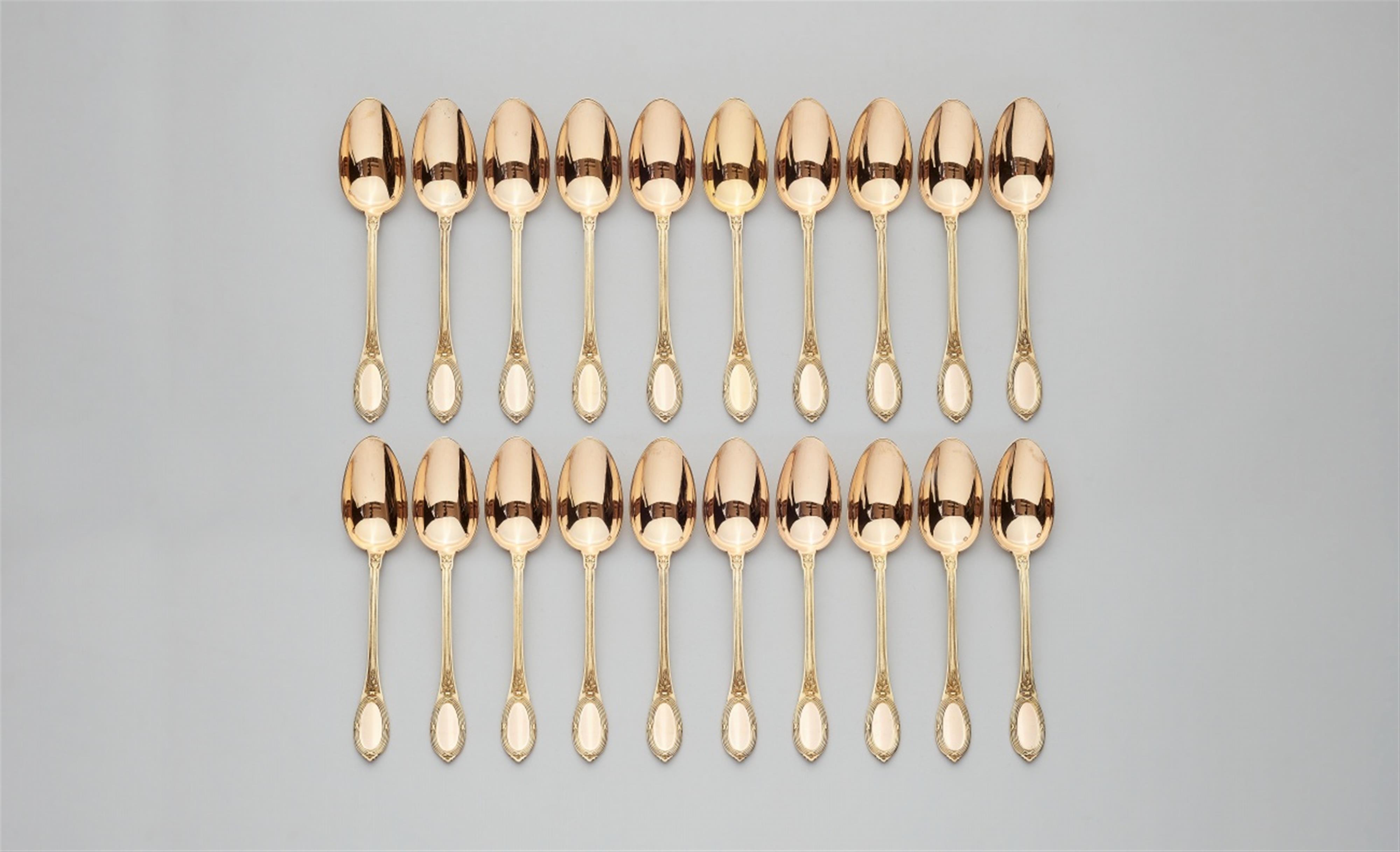 Twenty French silver gilt dessert spoons - image-1