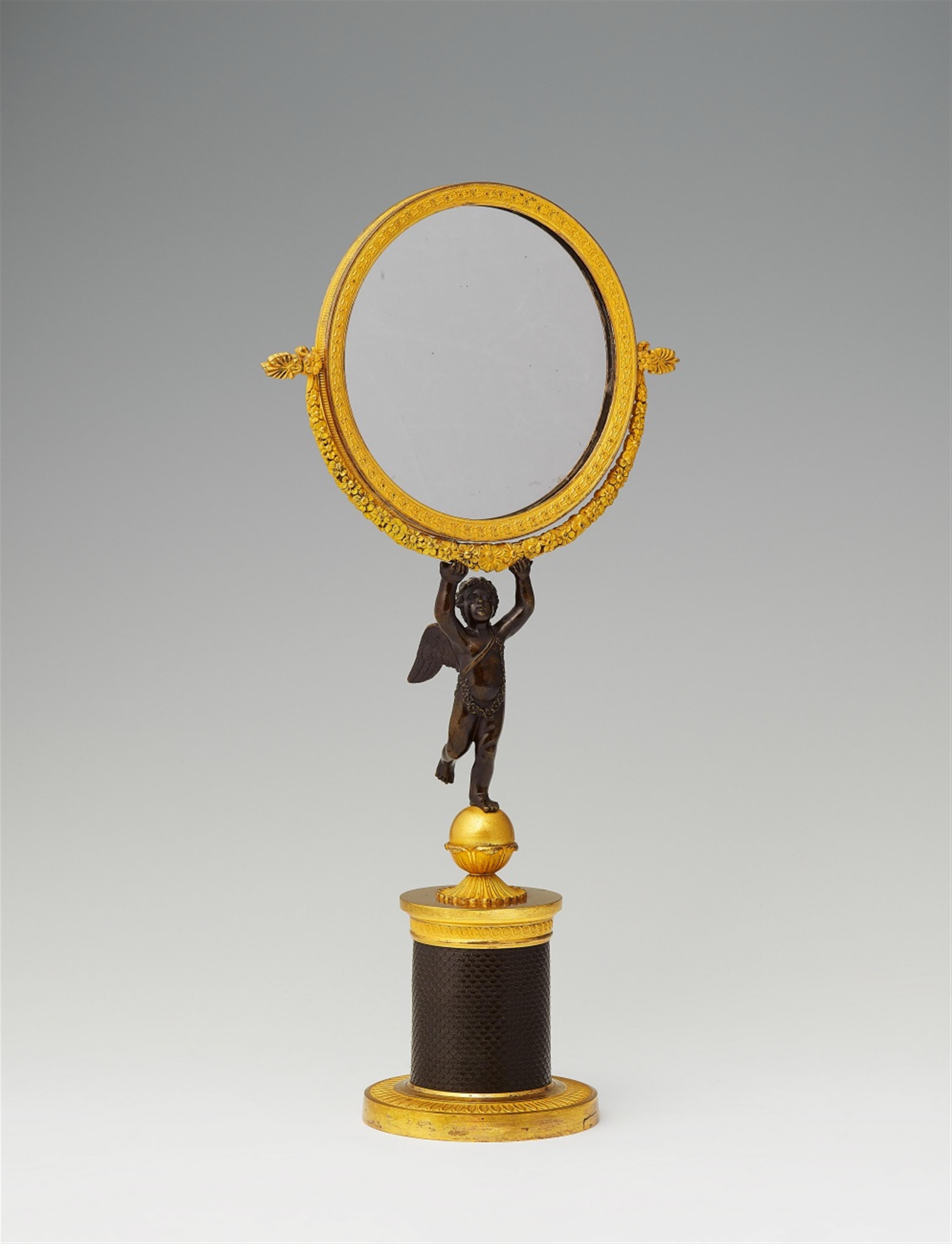 A French Restoration era ormolu table mirror - image-1