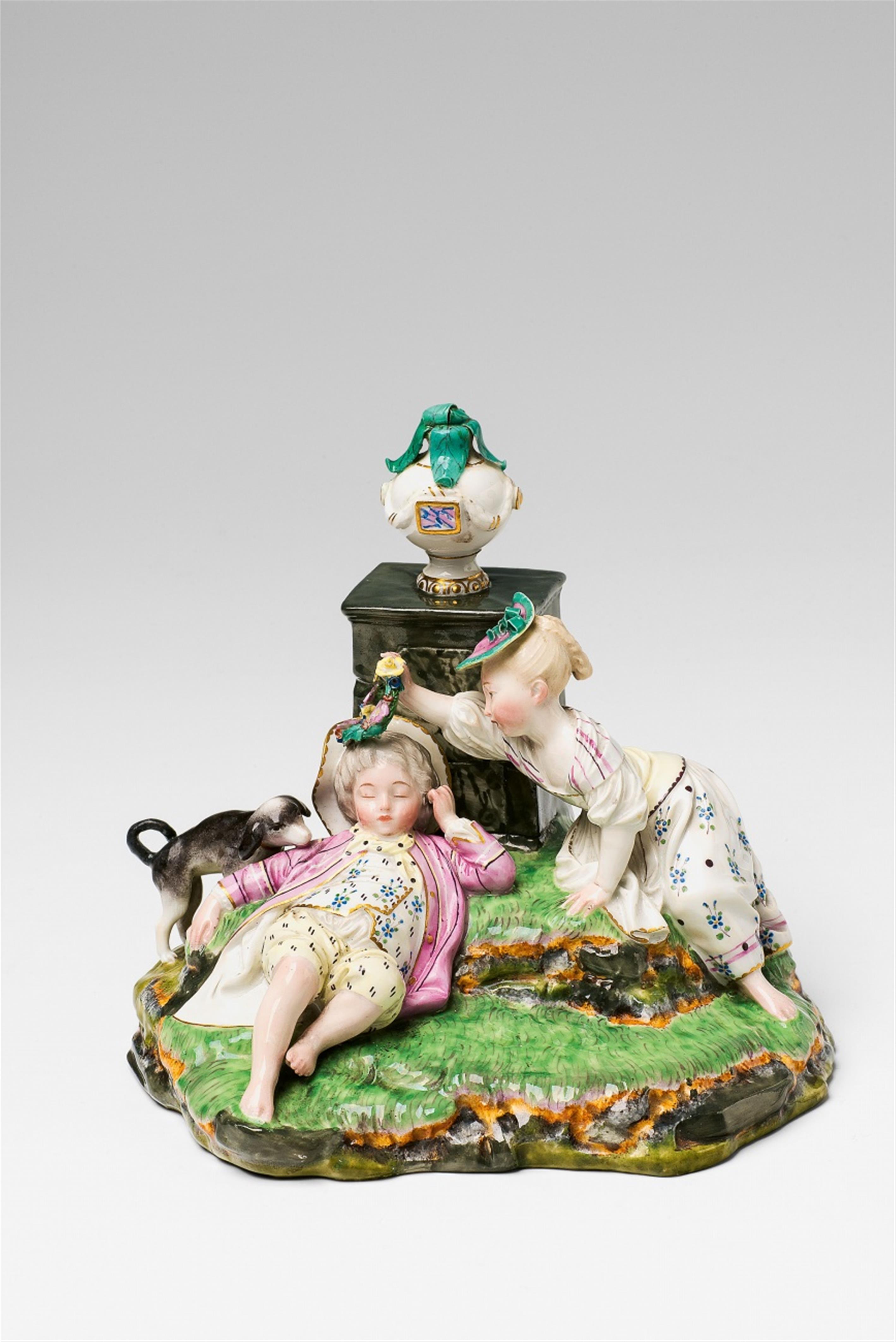 A Höchst porcelain figure group with a sleeping boy - image-1