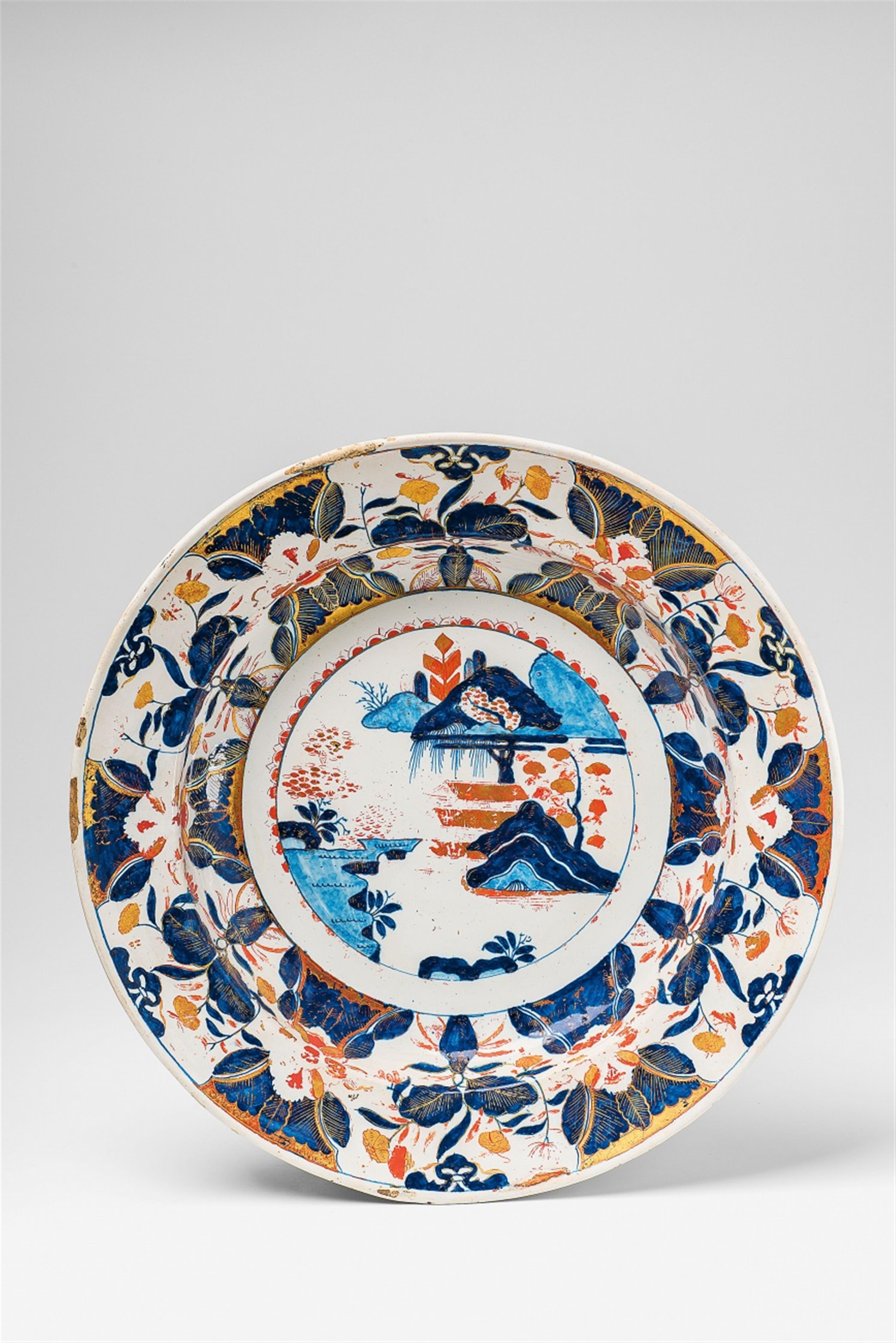 A large Ansbach faience dish with Imari style decor - image-1