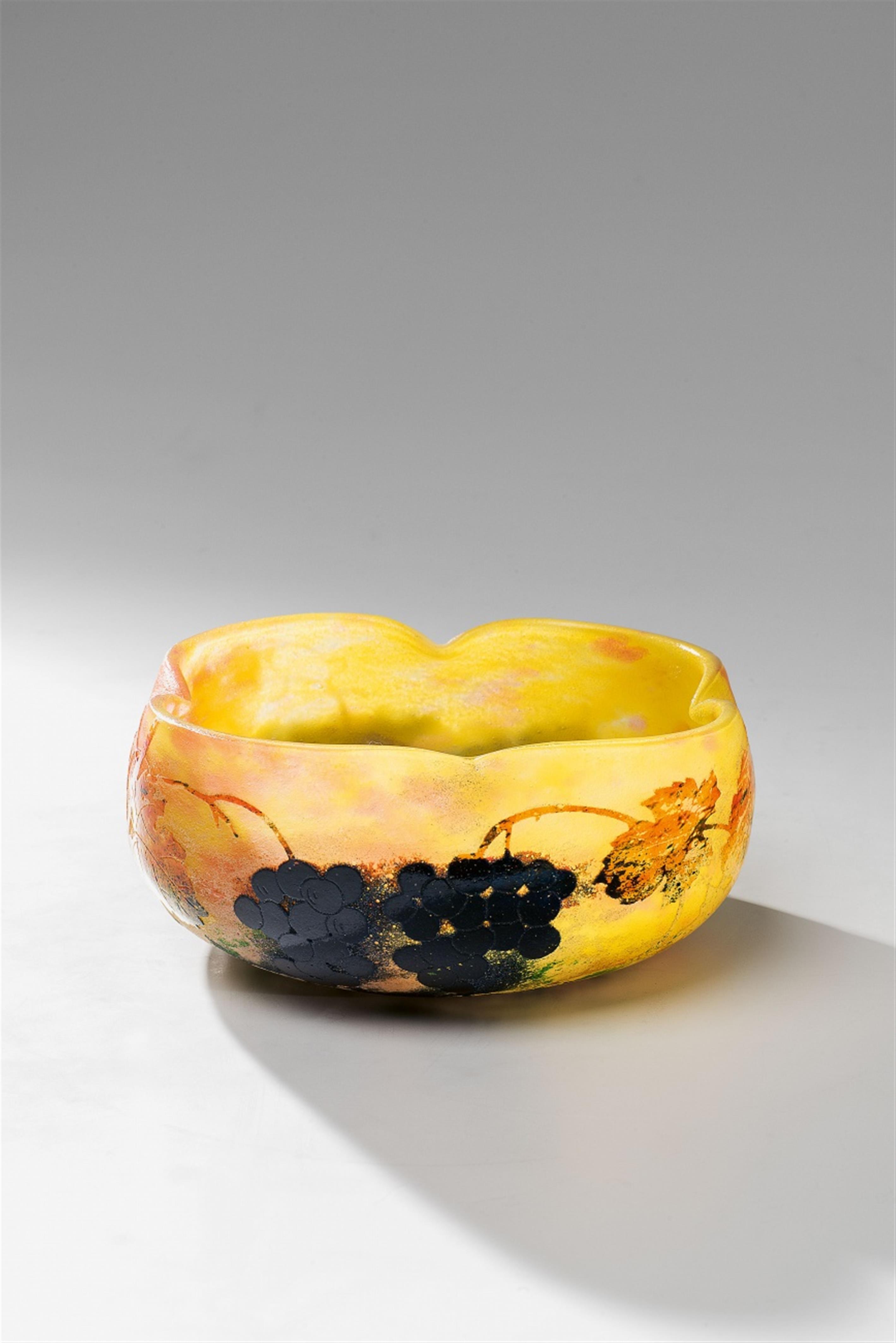 A Daum Frères glass bowl with grape vine decor - image-1