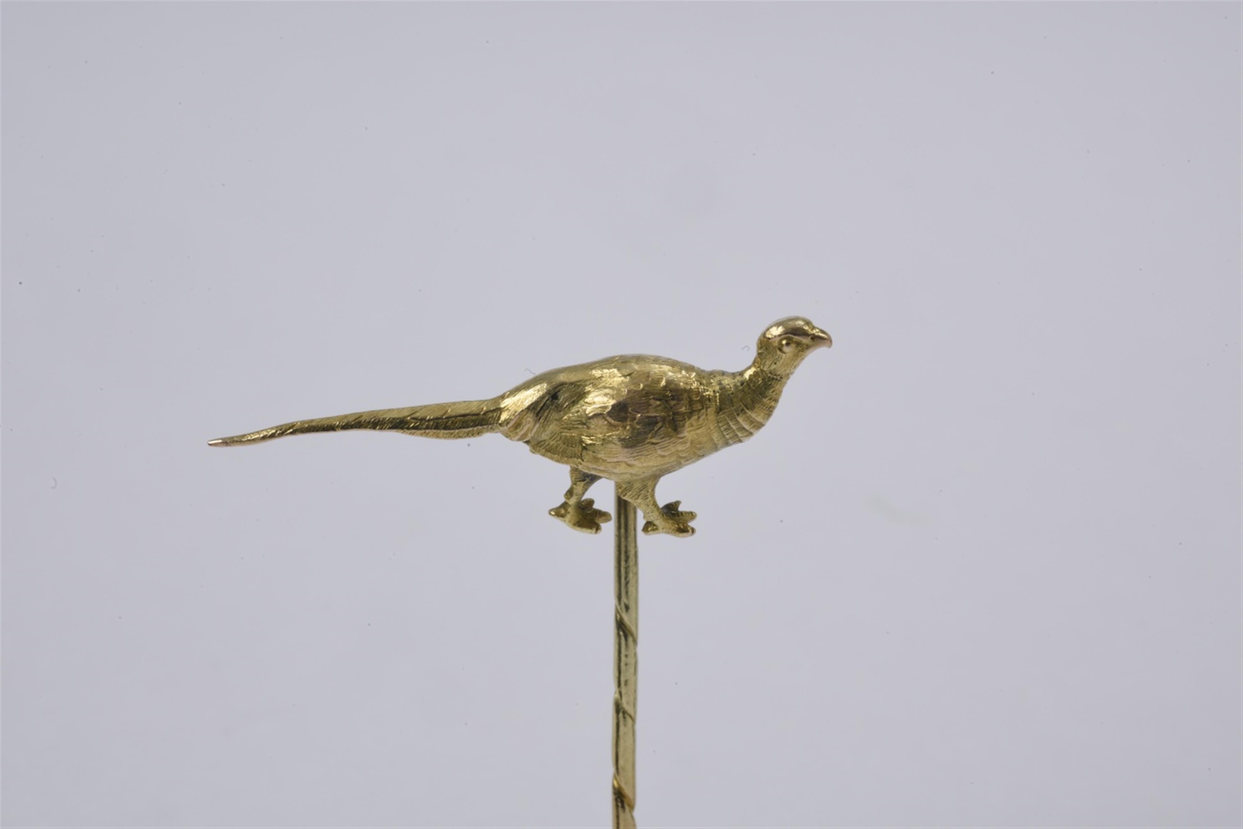 A 14k gold tie pin with a pheasant - image-1