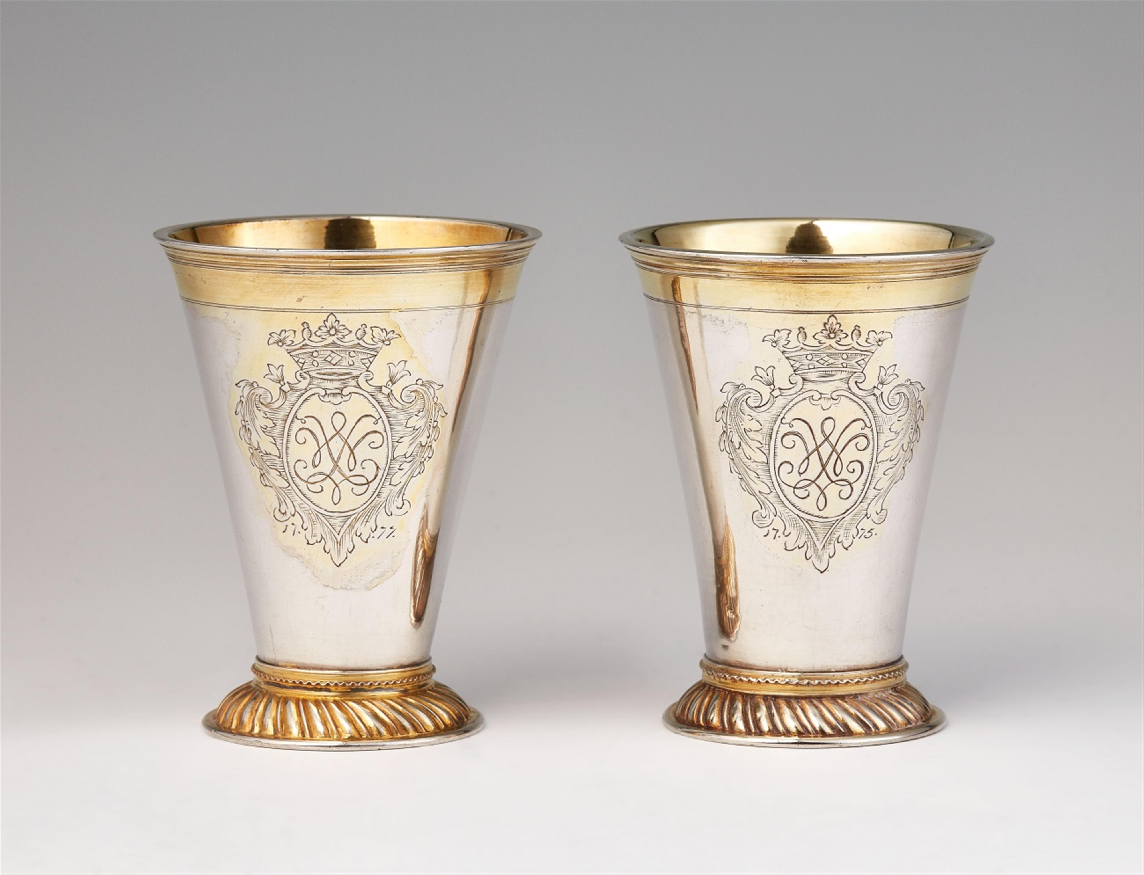 A pair of parcel gilt Riga silver beakers - image-1