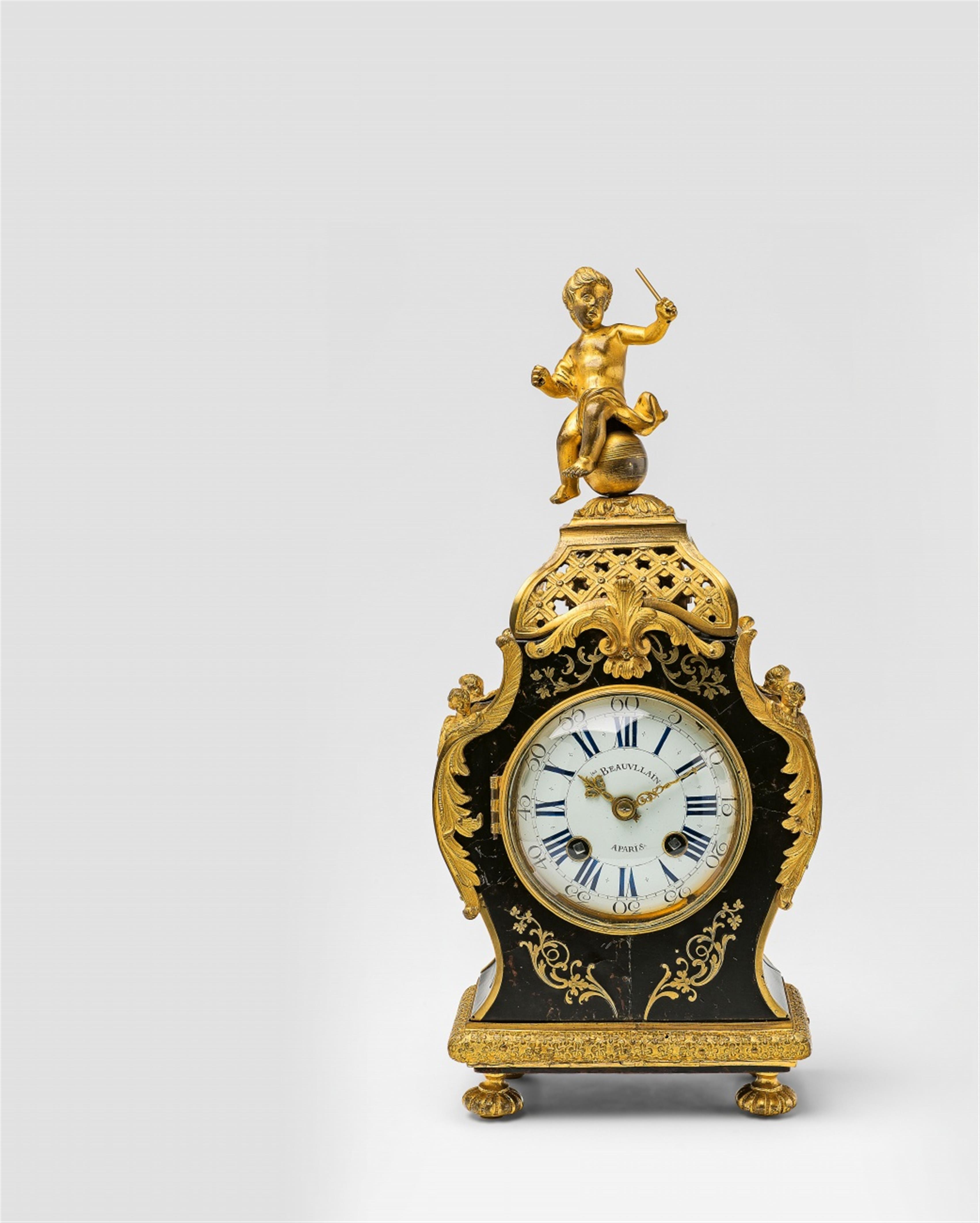 A Parisian Régence period "tête de poupée" clock - image-1