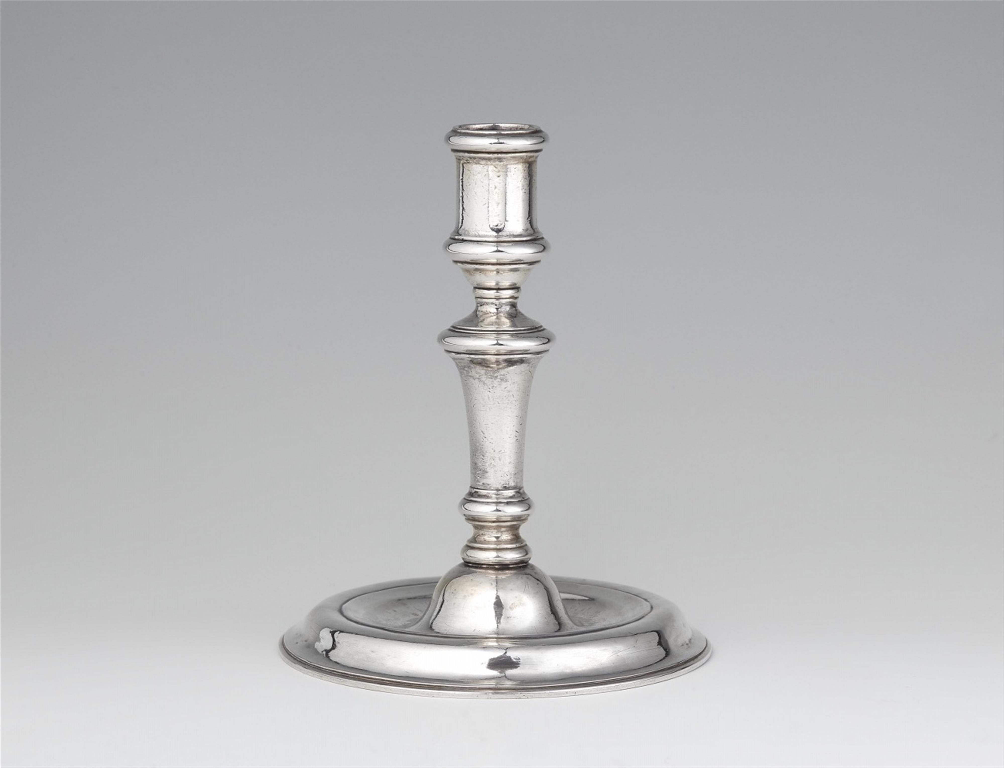 A silver candlestick from the Dresden court silver collection - image-1