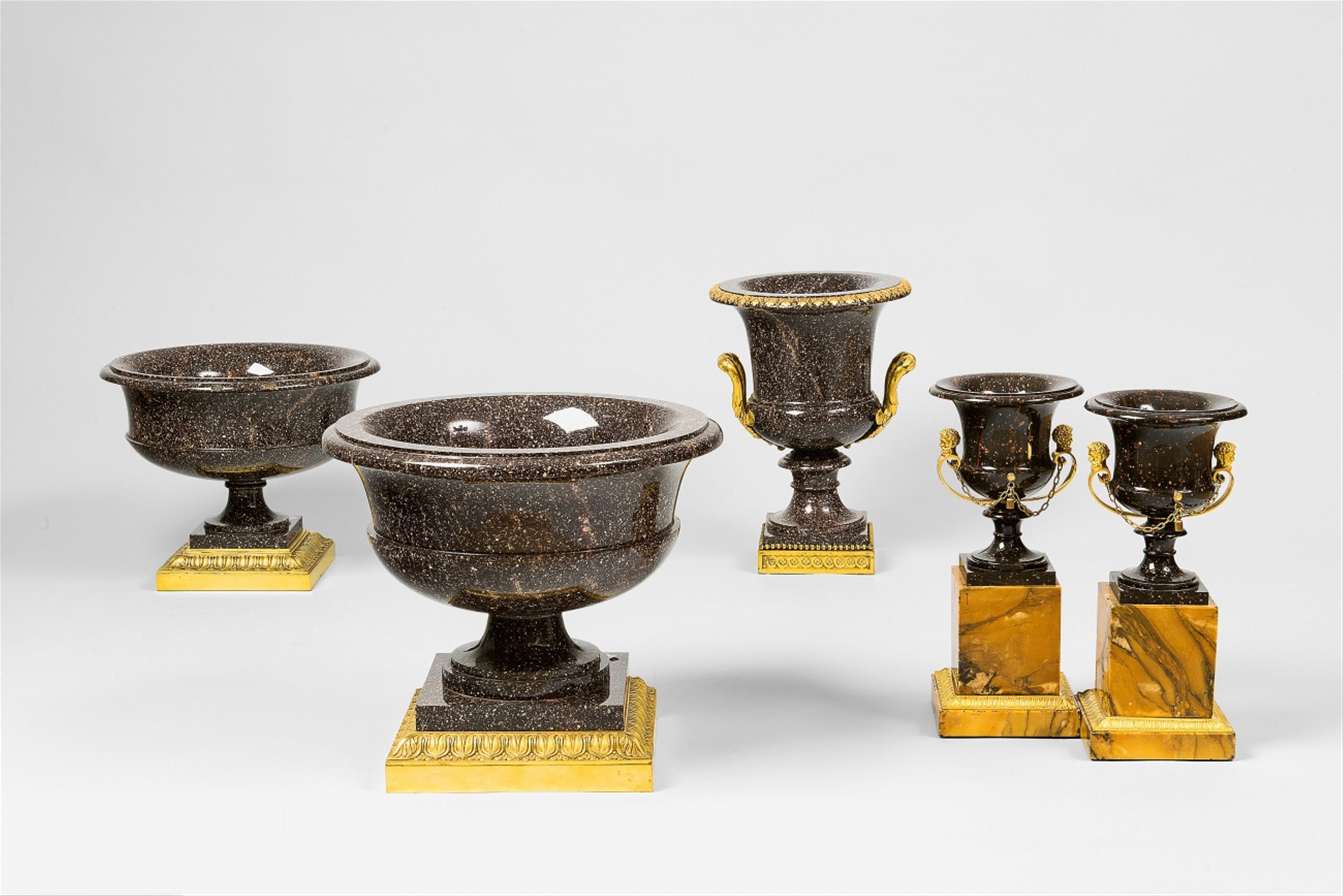 A rare set of five ormolu-mounted carved porphyry krater vases - image-1