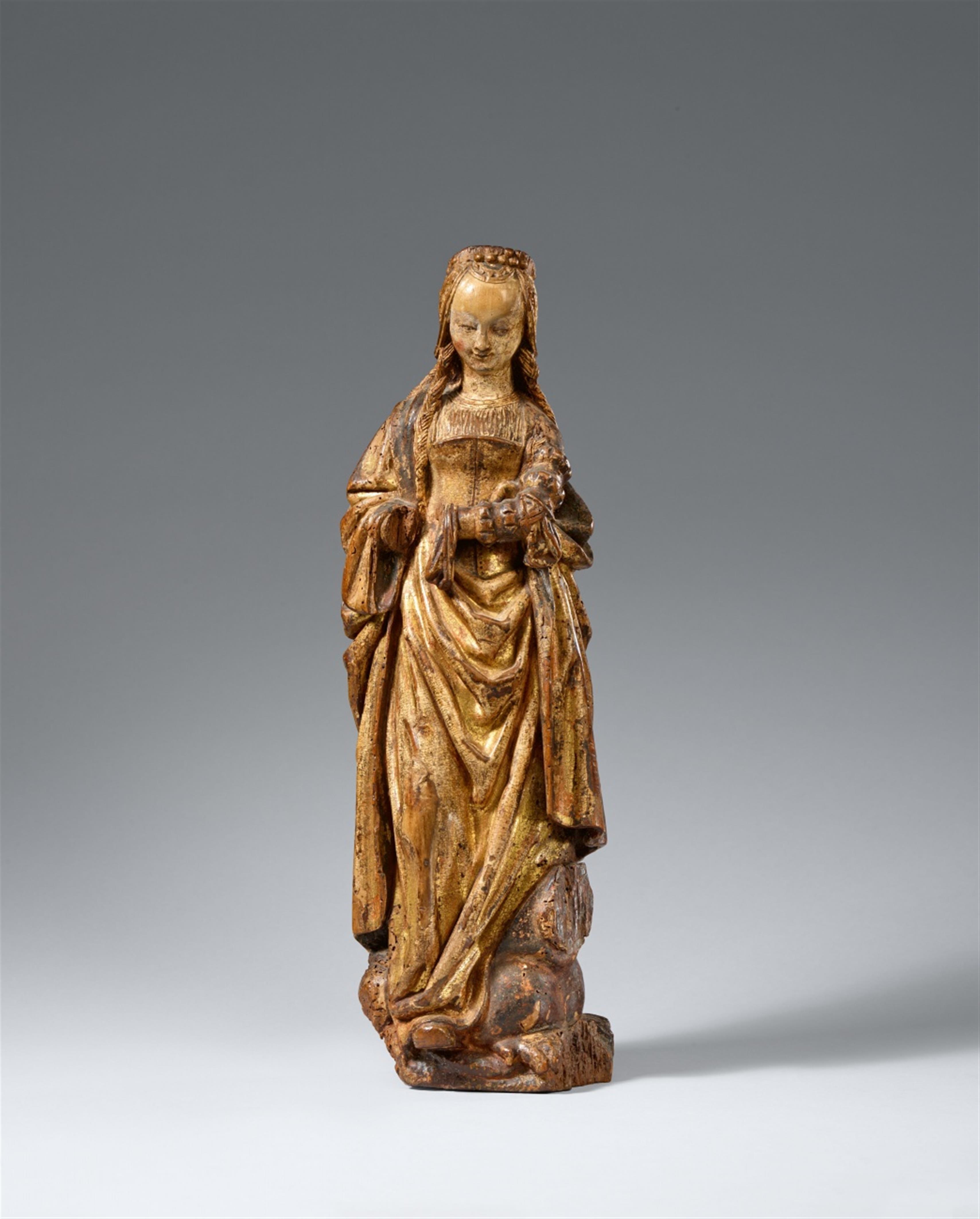 Mechelen circa 1520 - A Mechelen carved wooden figure of Saint Margaret, circa 1520 - image-1