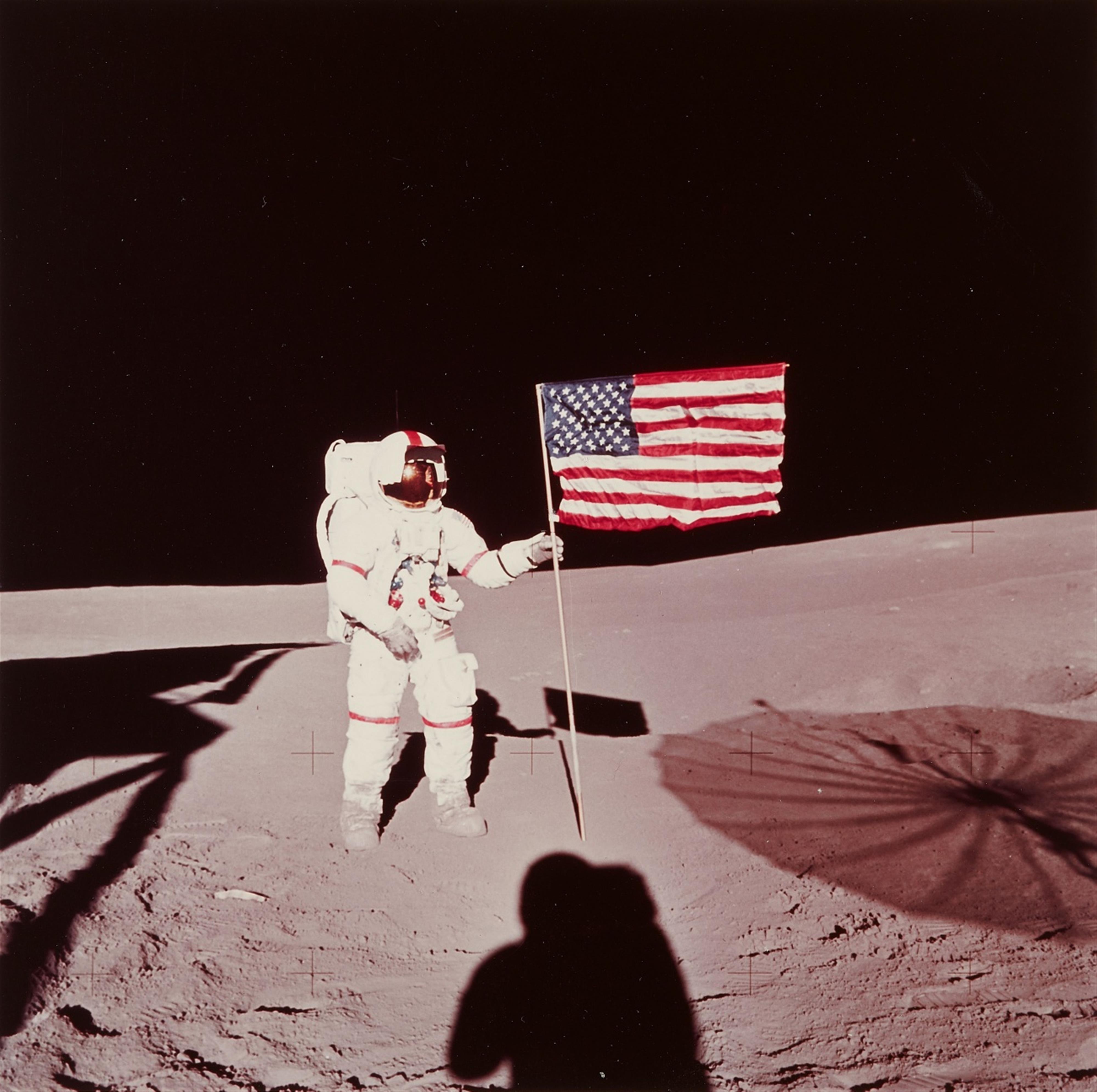 NASA - Astronaut Alan B. Shepard standing with American flag on lunar surface, Apollo 14 - image-1