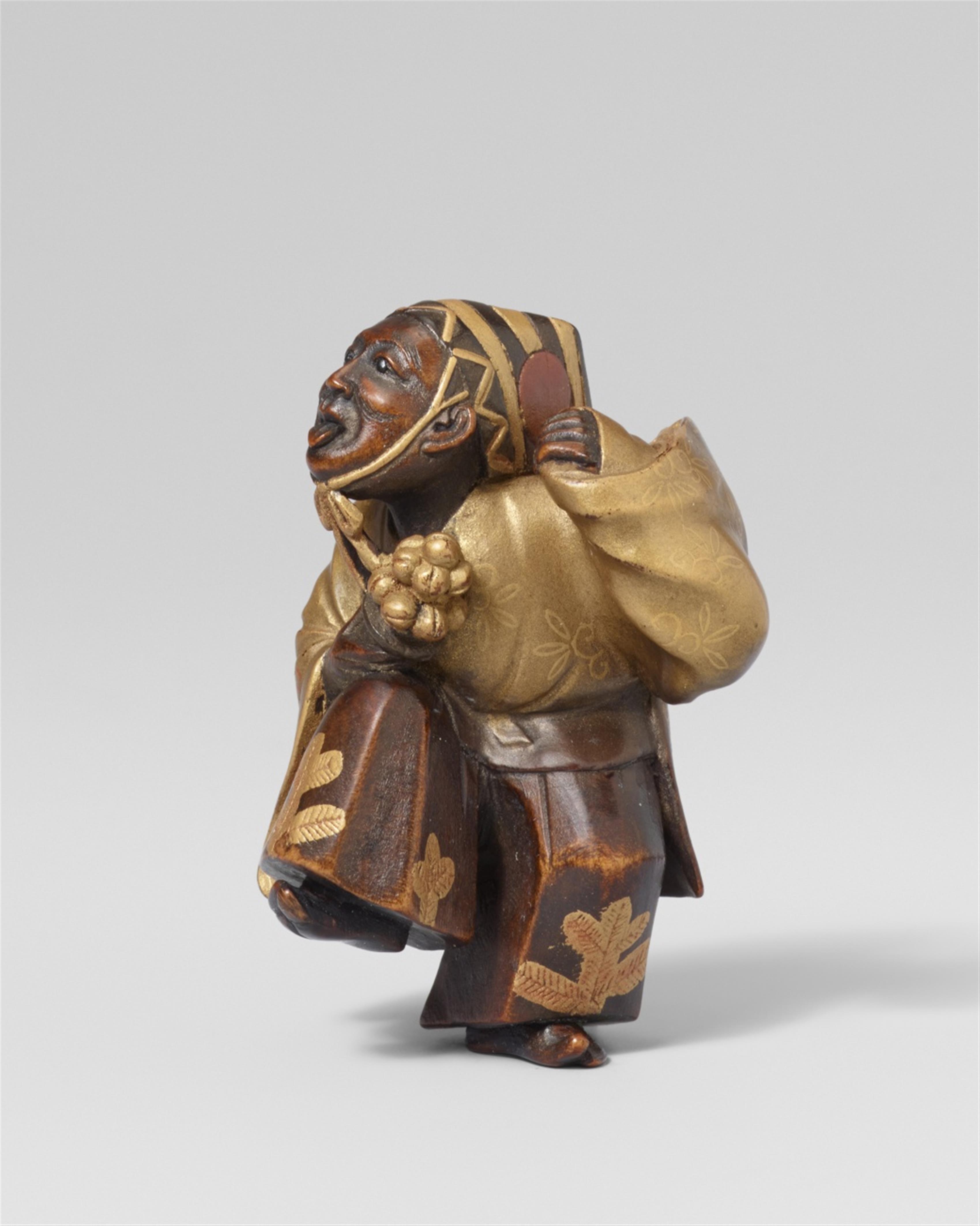 A wood and lacquer netsuke of a manzai dancer. Second half 19th century - image-1